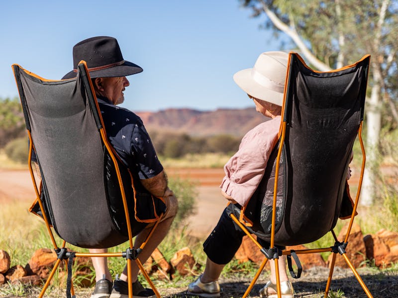 Couple sitting at Kings canyon campsite.