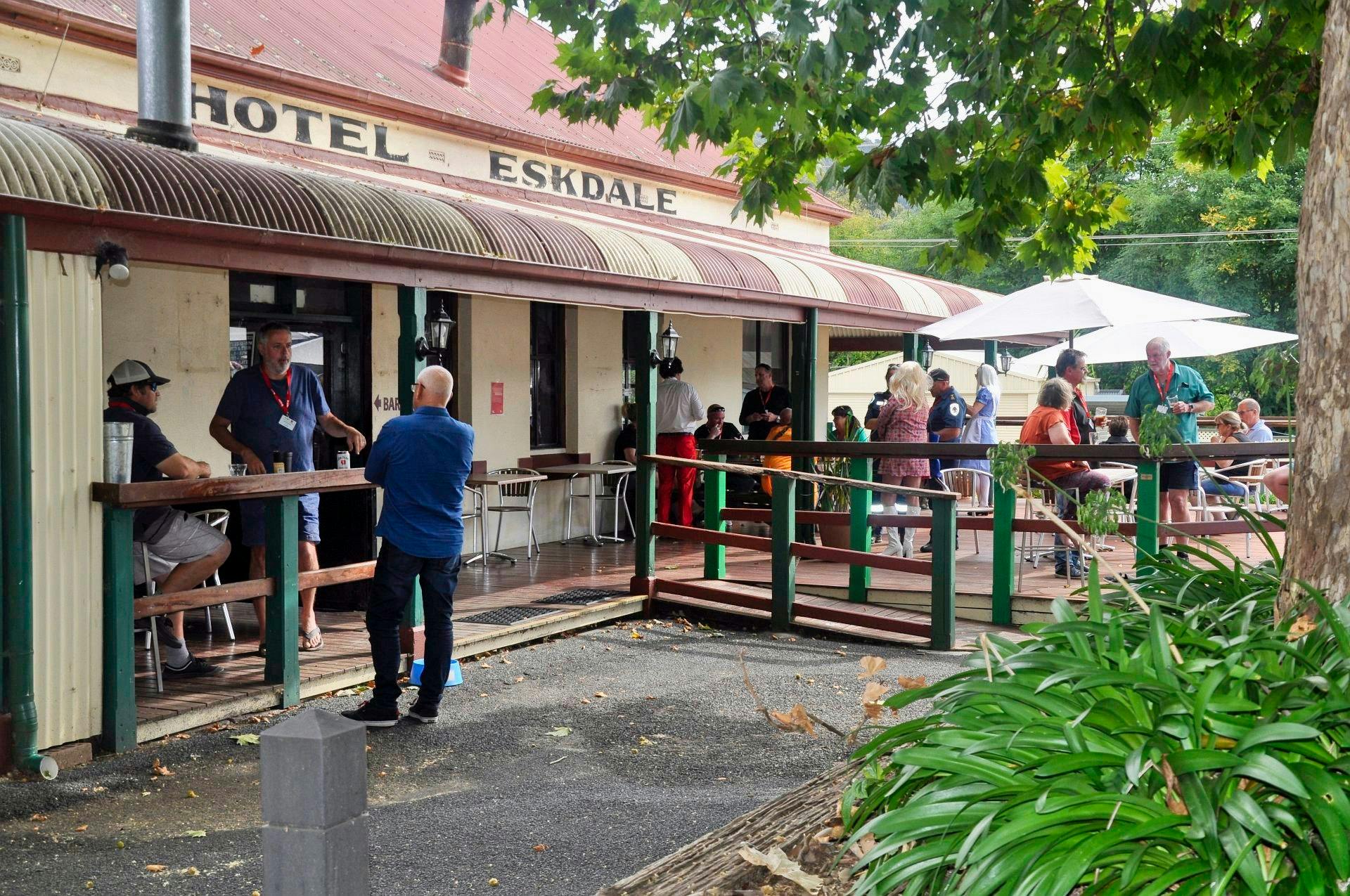 Car Bash entrants enjoying a drink on the deck