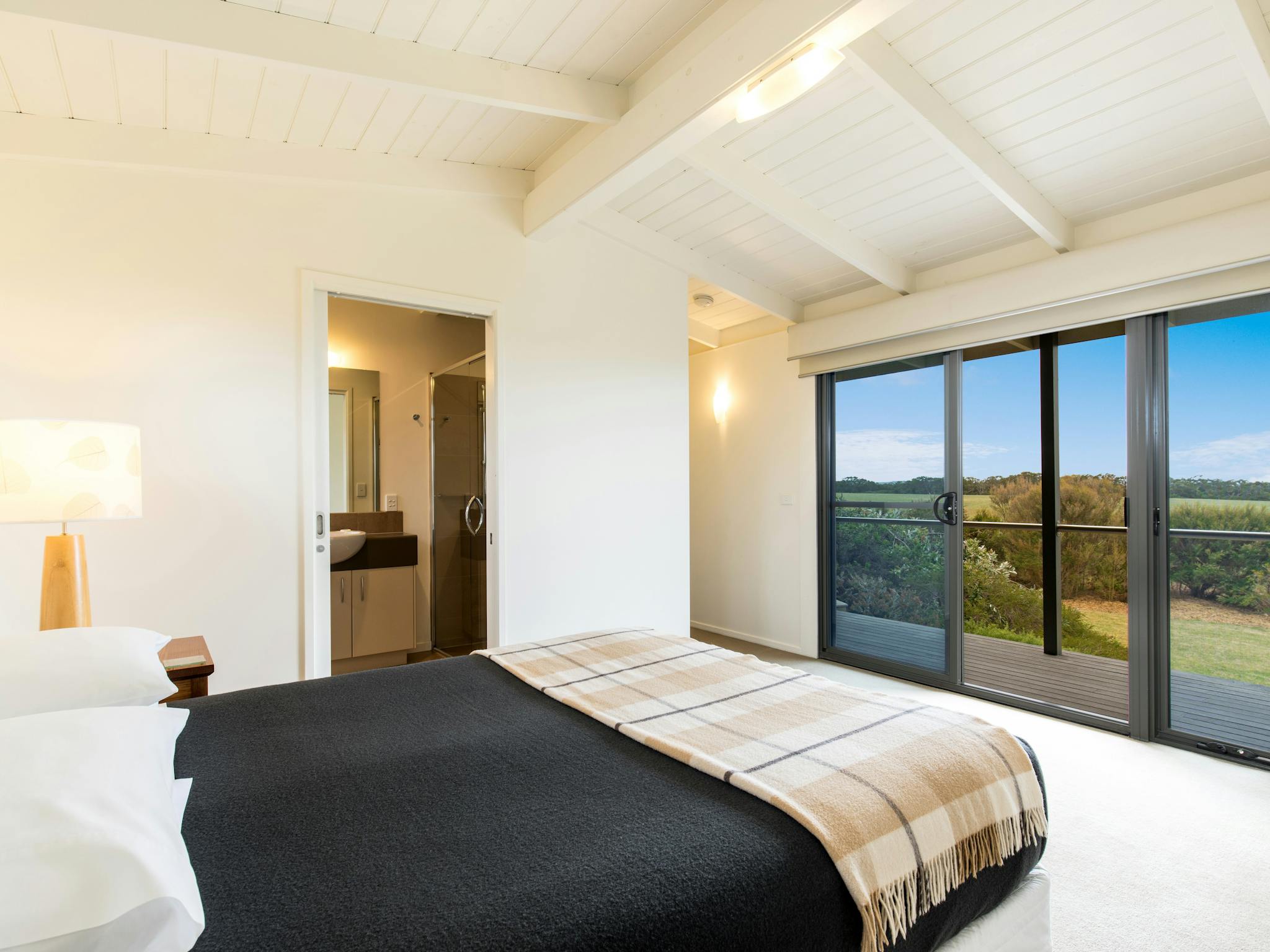 Queen bed and view through window