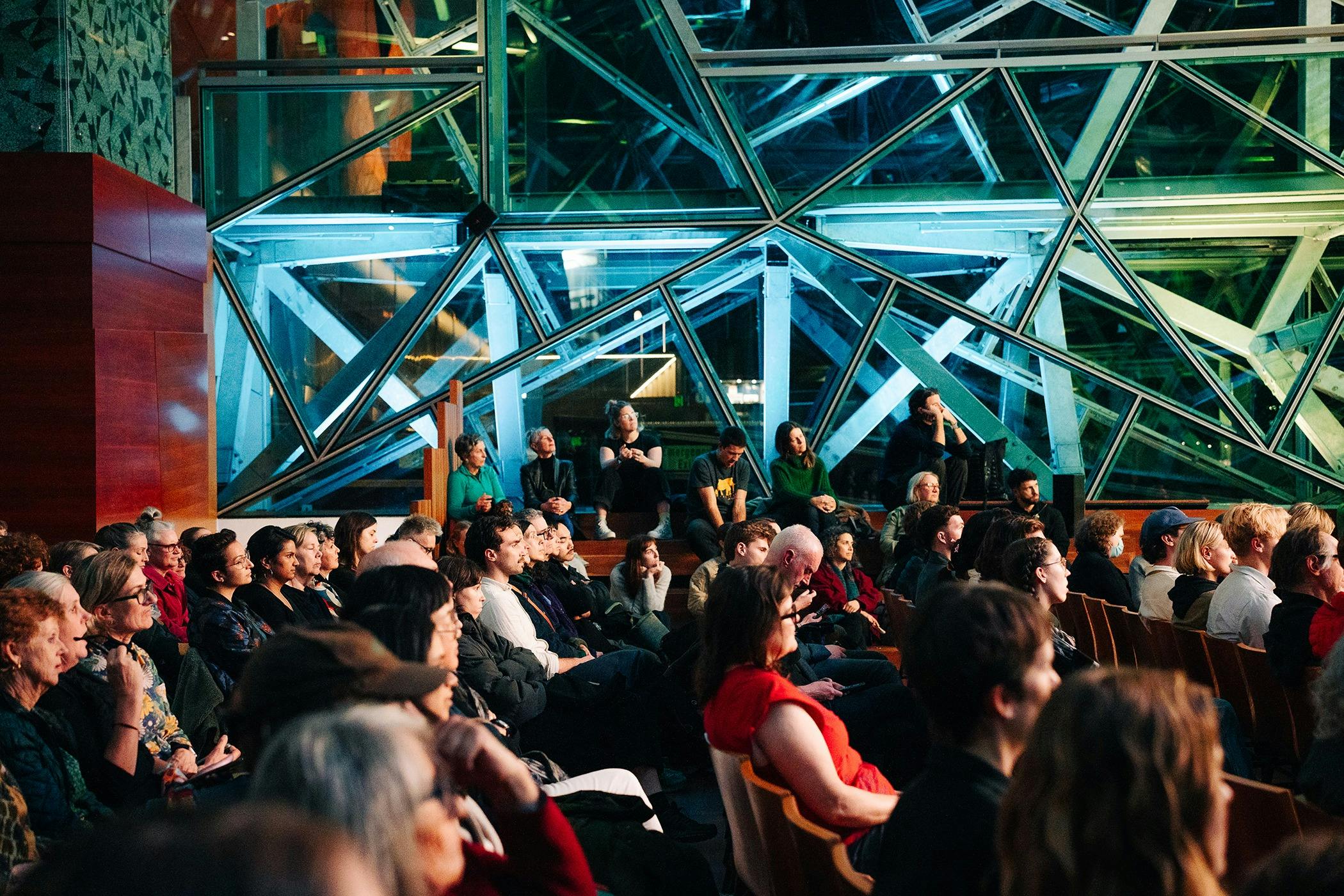 Side view of audience seated in The Edge at Fed Square