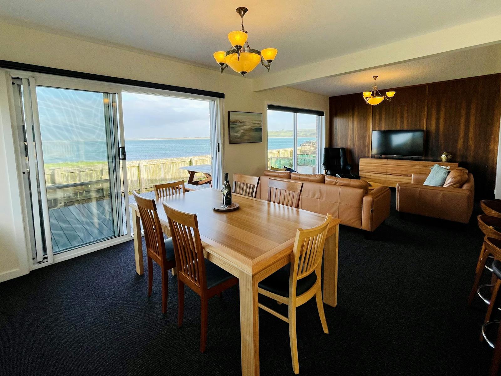 Open plan kitchen, dining, lounge - you can't get any closer to the water at Stanley Village