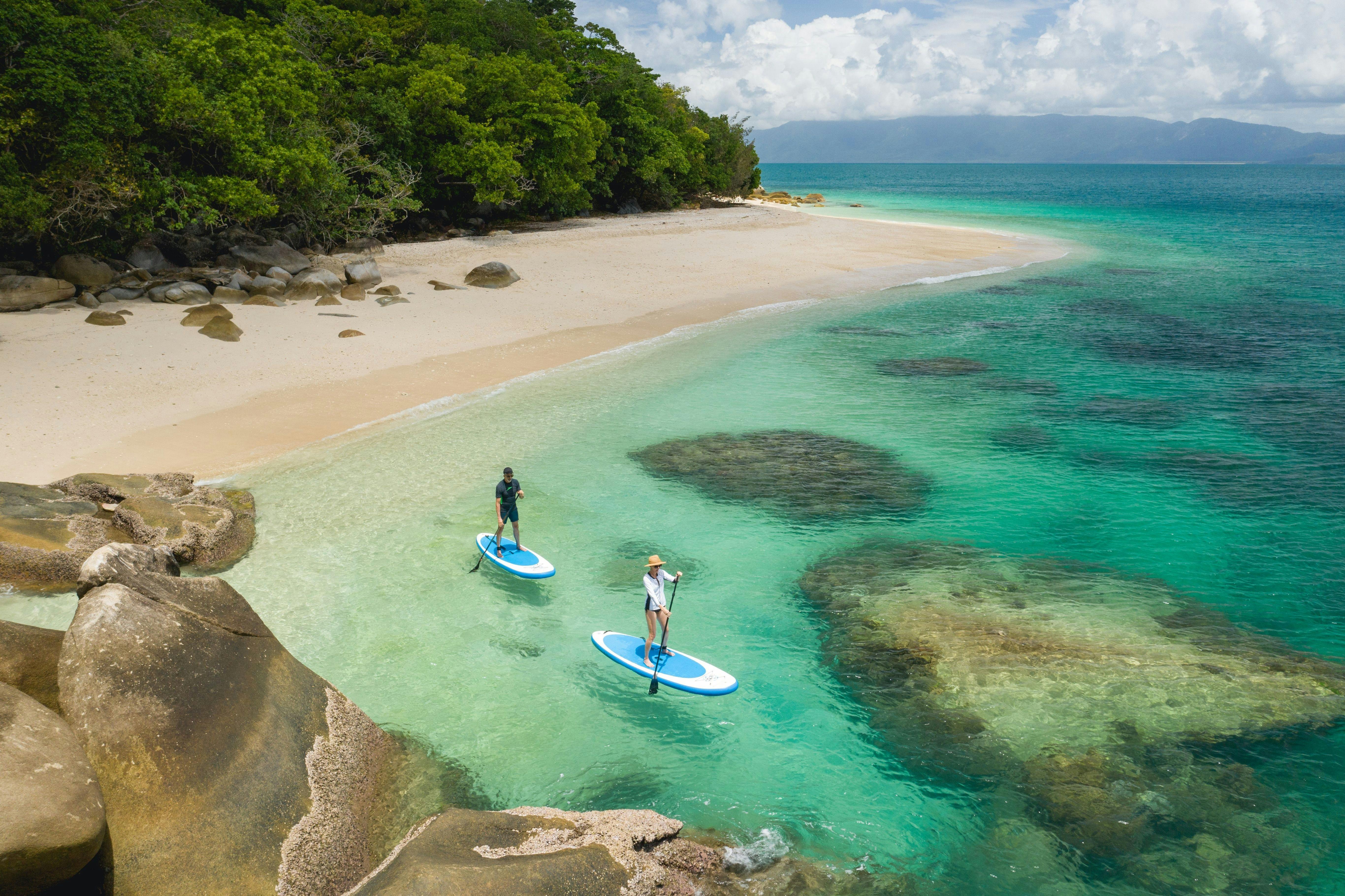 2 Paddleboarders enjoy Fitzroy Island