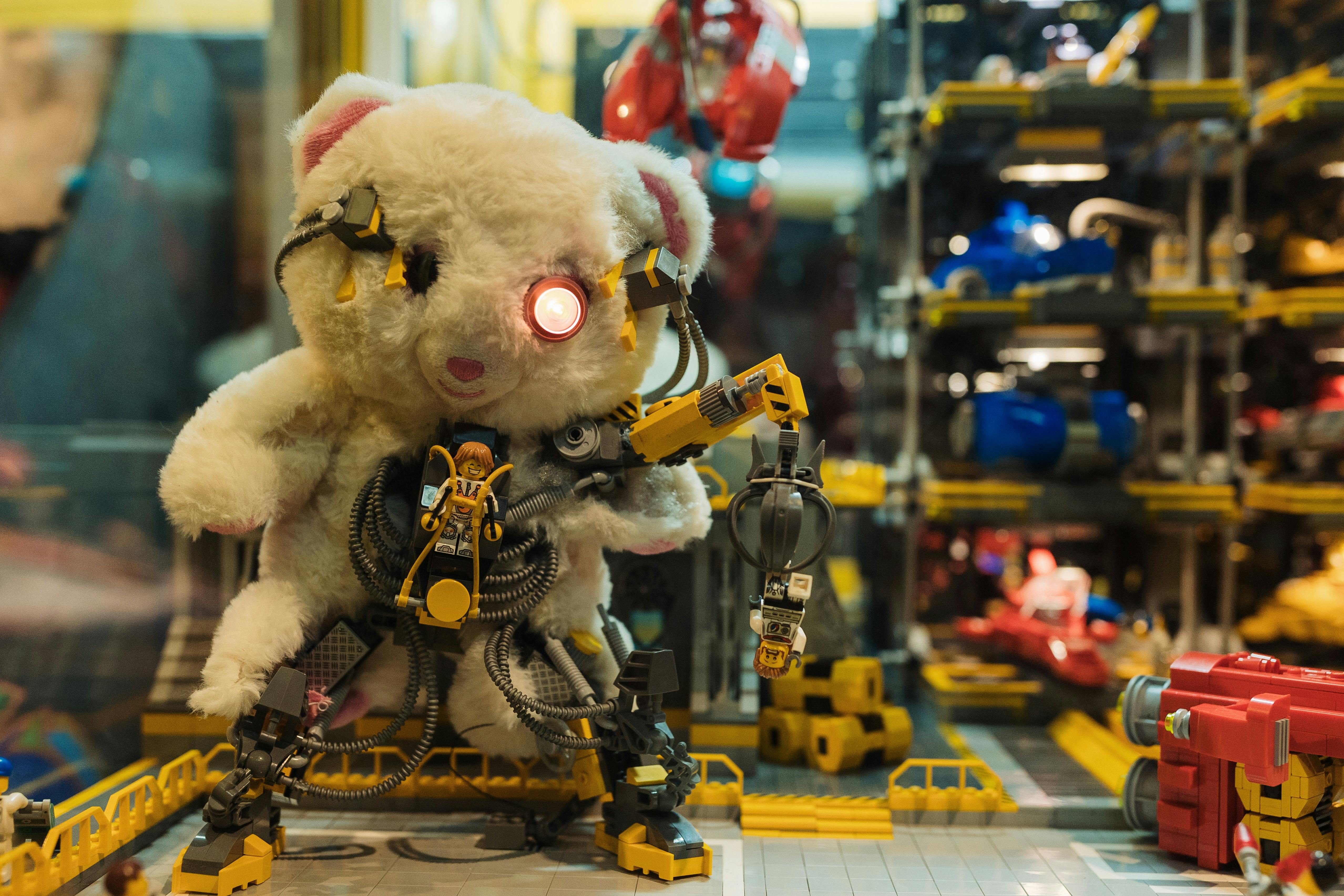Closeup image of RELICS exhibition with vintage teddy bear and LEGO® elements