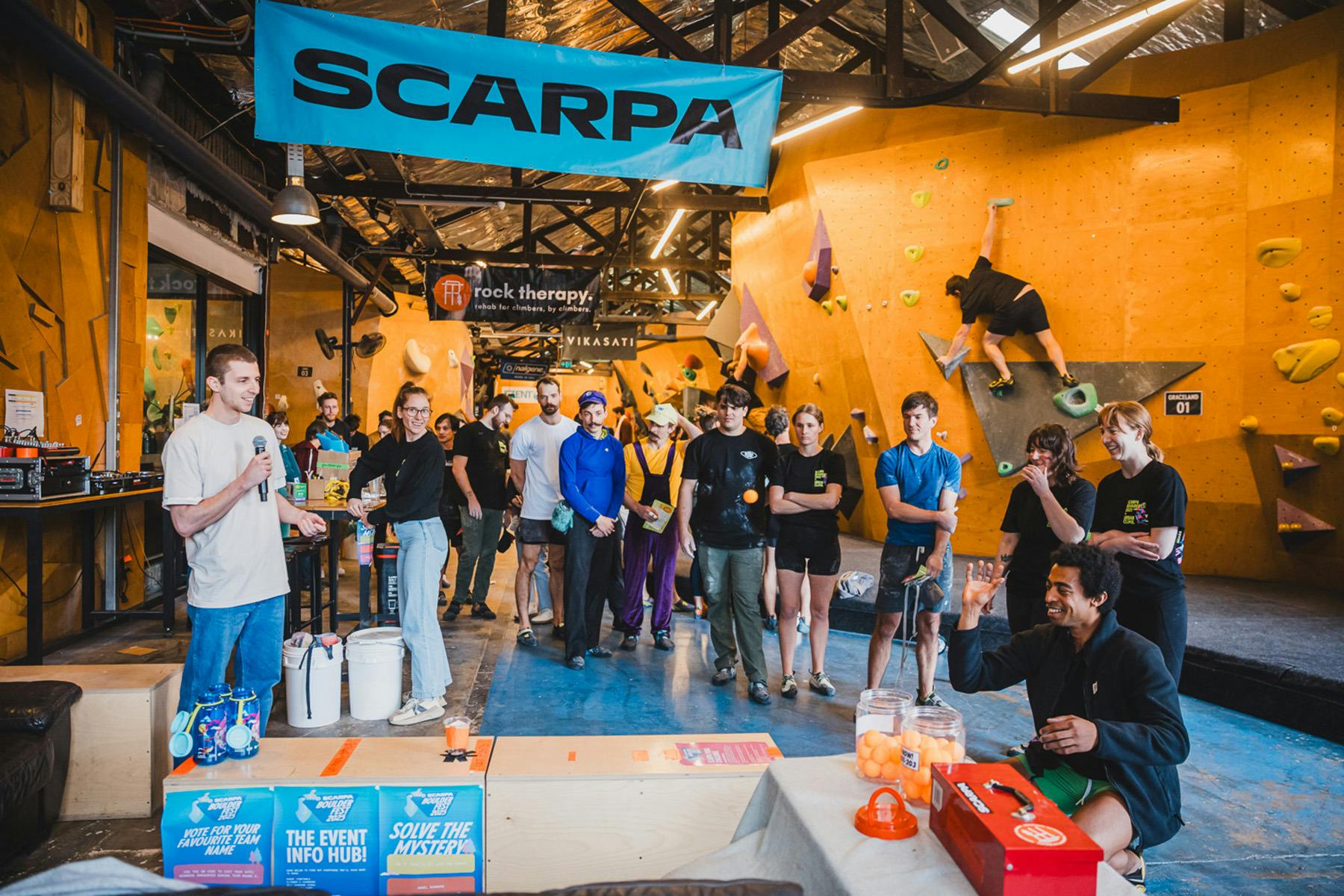 Climbers taking a break to participate in the SCARPA Nalgene Bottle Pong Challenge