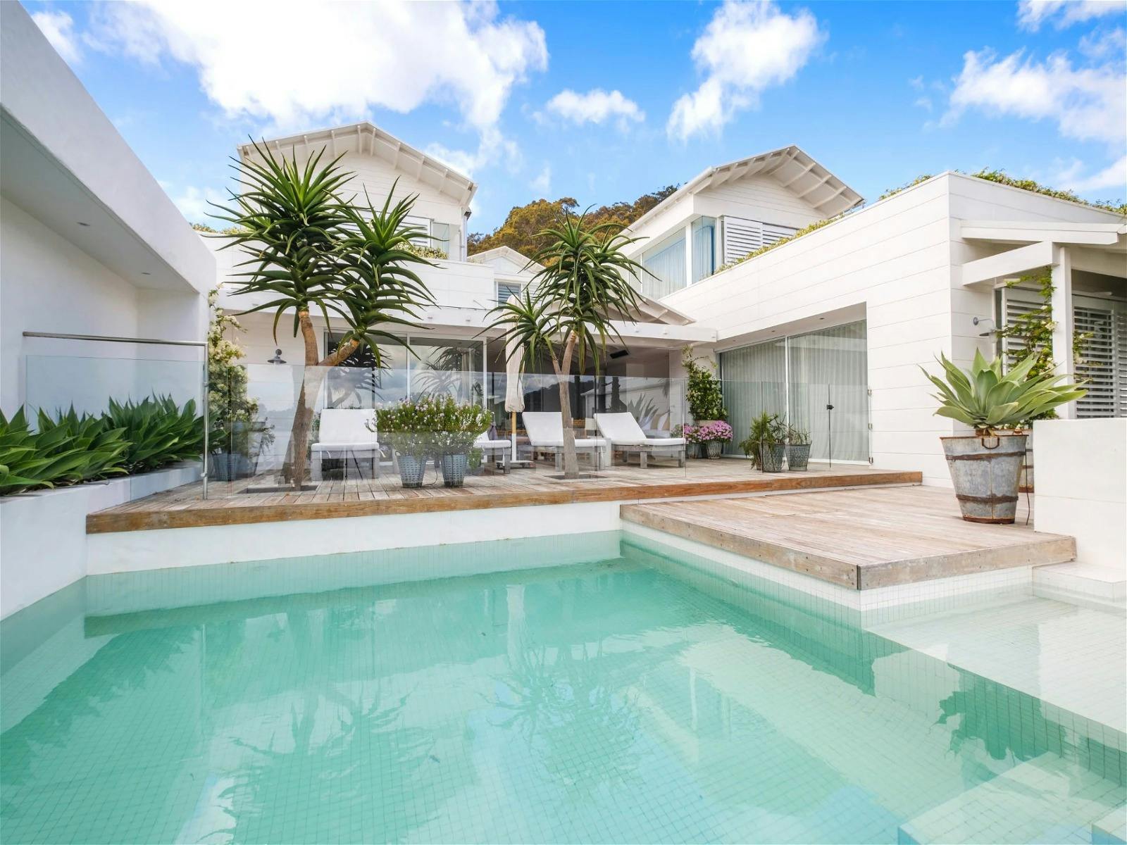 resort-style pool area with an infinity plunge pool