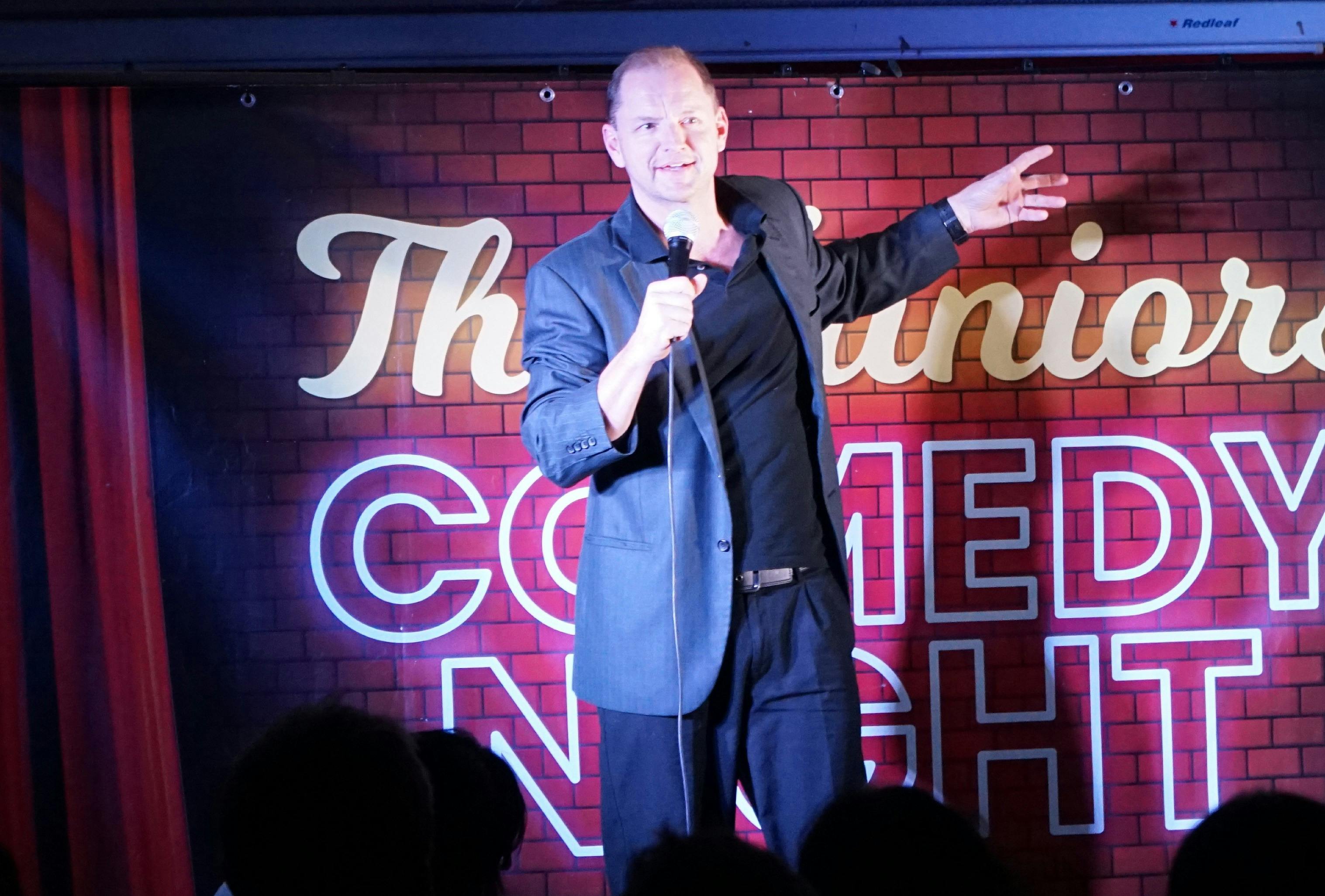 Sydney comedian Jonas Holt performing on stage at Maroubra Comedy Club in Sydney