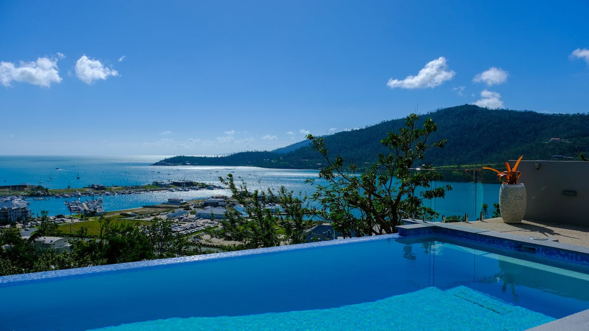 Stunning ocean views from a hilltop infinity pool at Elementa Whitsundays