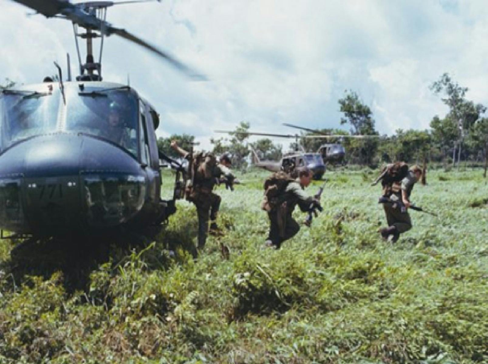 Helicopter with soldiers jumping out
