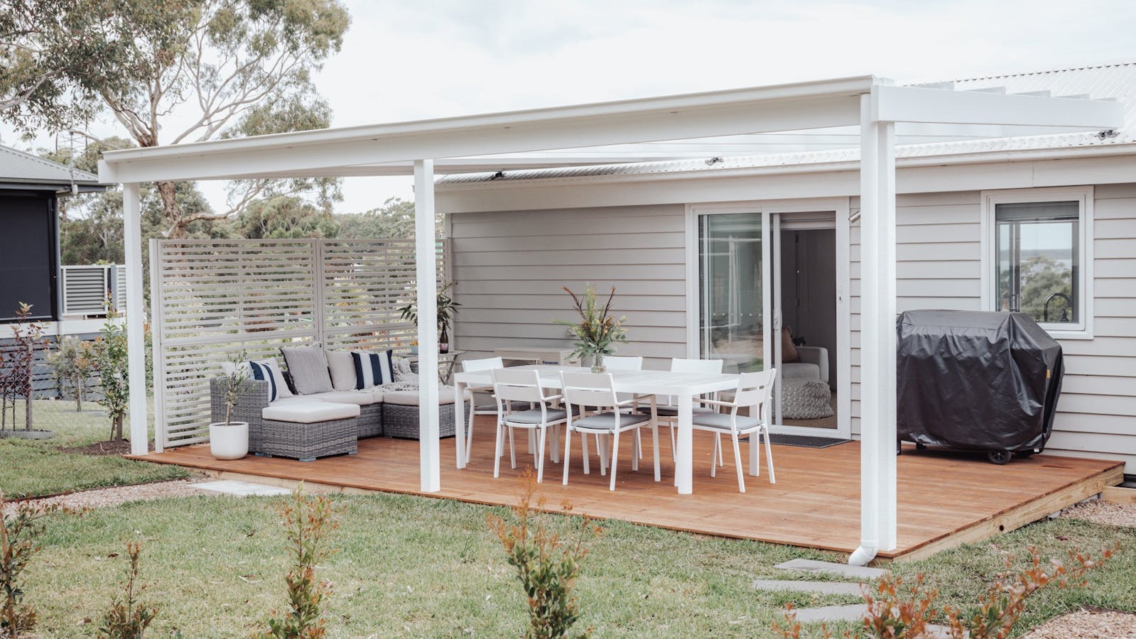 Back of house entertaining area with outdoor setting lounge and bbq area