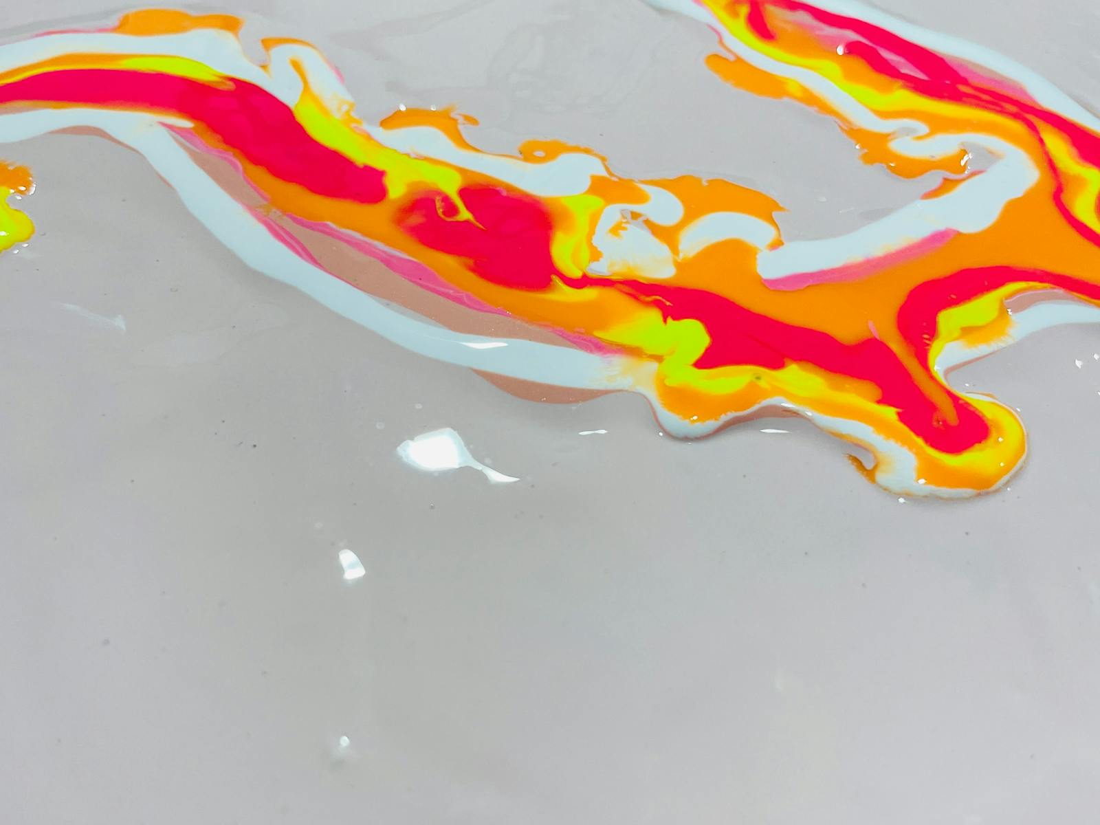 poured paint: orange, yellow, white