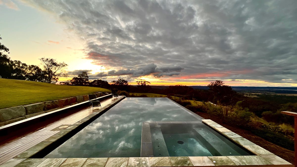 Storms and sunset over the pool