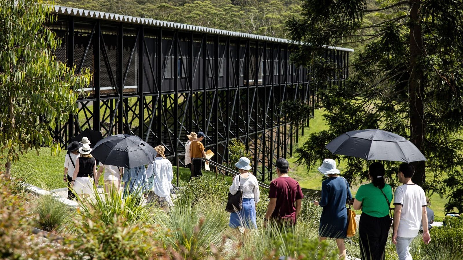 Visitors walking past The Bridge for Creative Learning
