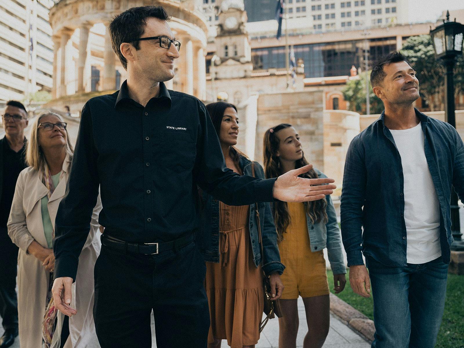 Visitors on a guided tour of Anzac Square