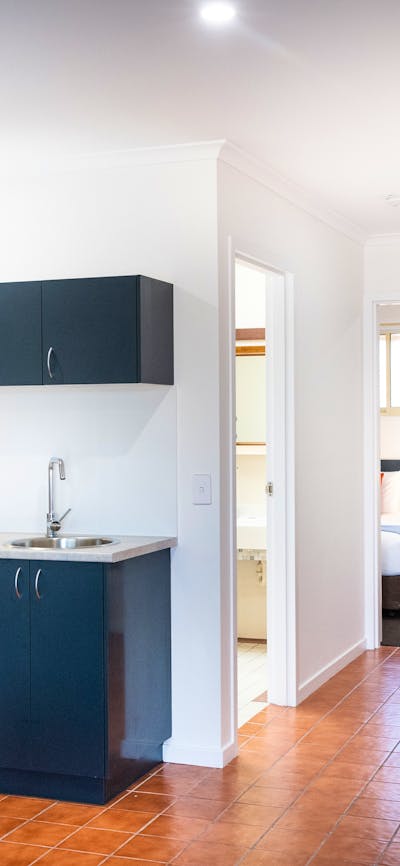 Large suites with kitchen facilities & multiple bedding options (including sofa bed) at River Motel.