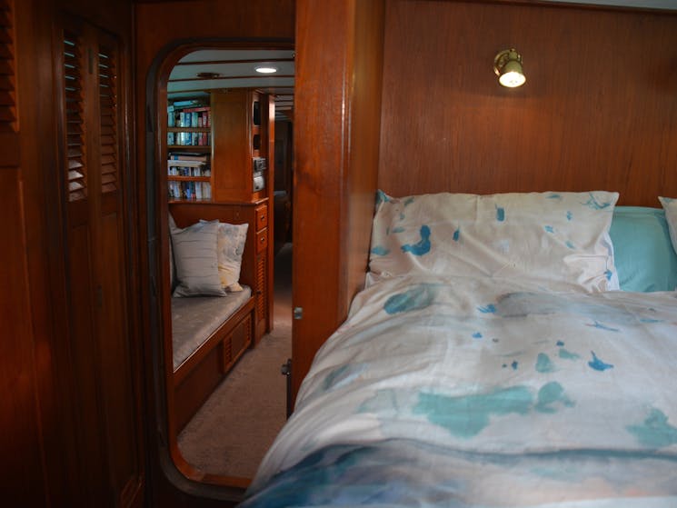 Forward stateroom has a double bed & 3 portholes. Adjacent bathroom can be converted to private