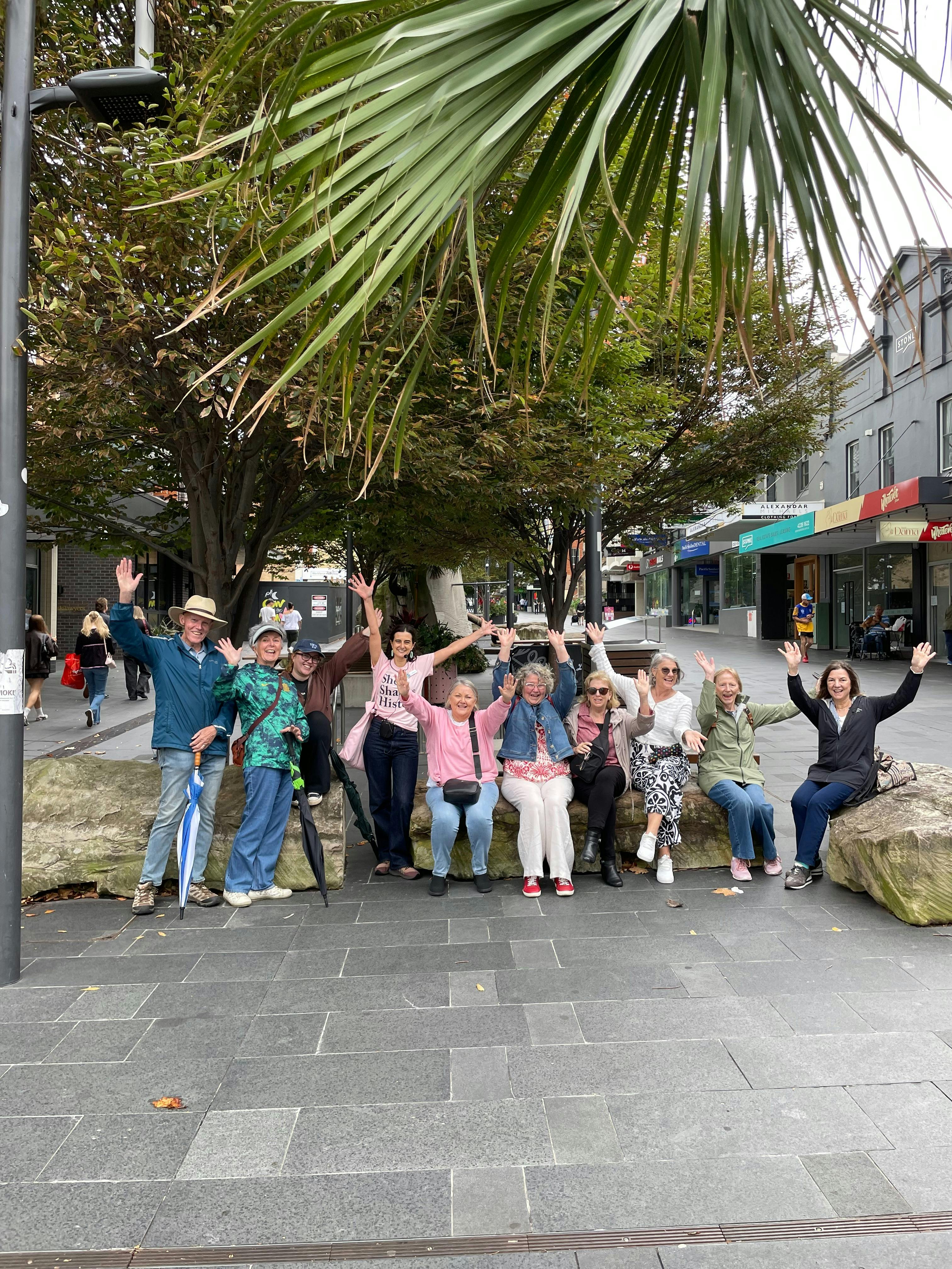 Happy She Shapes History Tour Guests pose for a photo