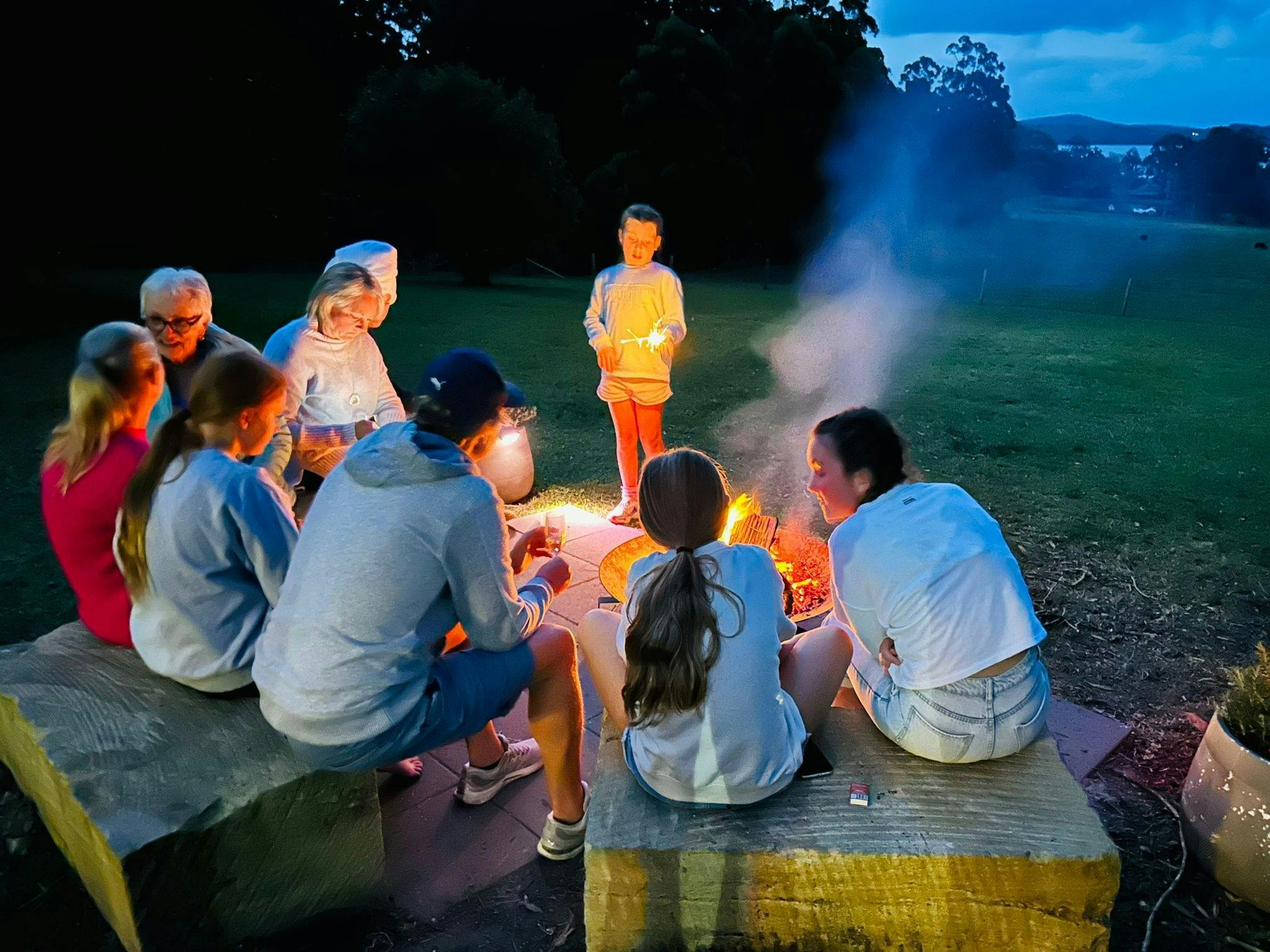 Guests using the fire pit