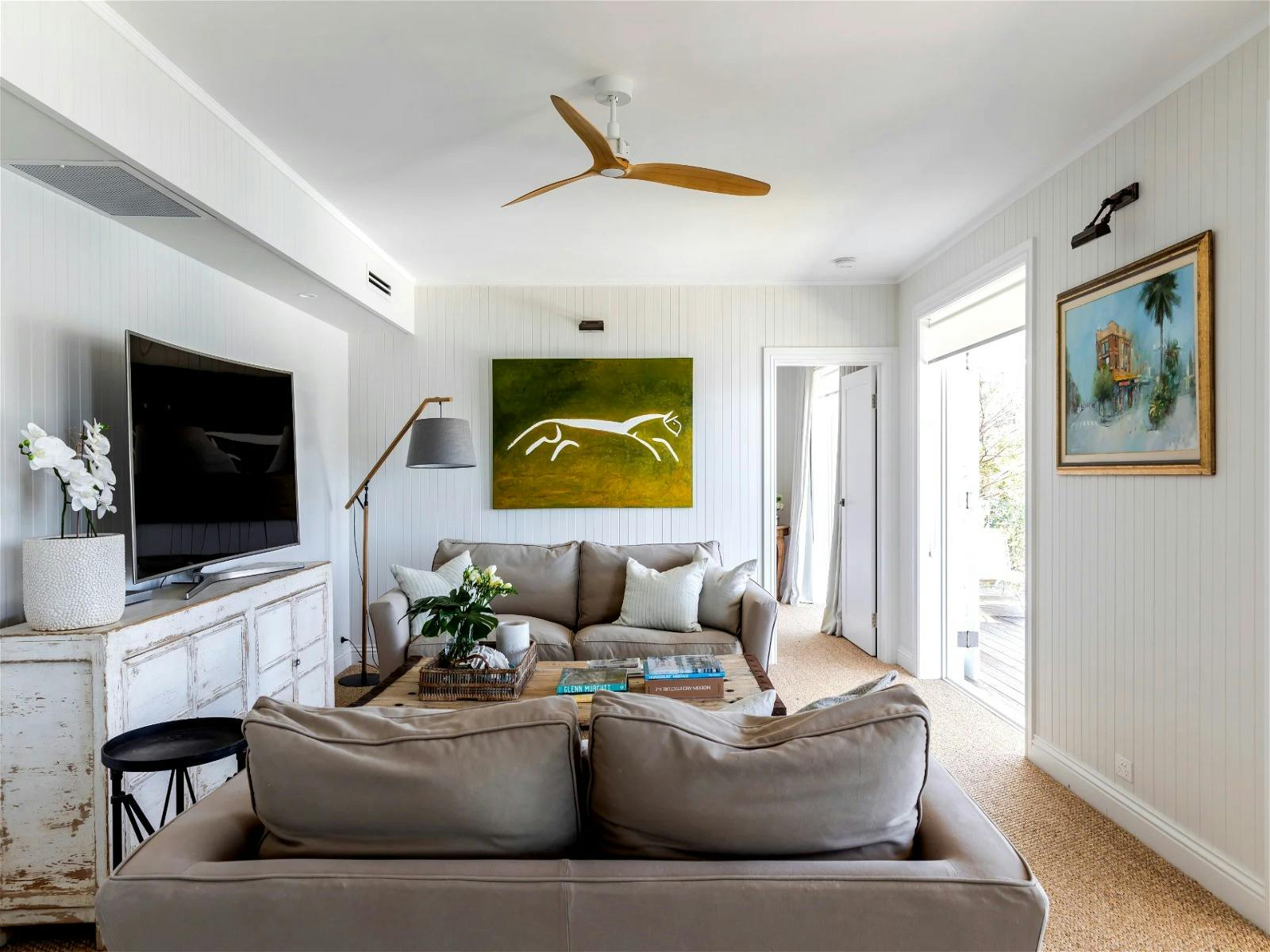 flexible living space downstairs which can work as a separate area for larger groups or as a retreat