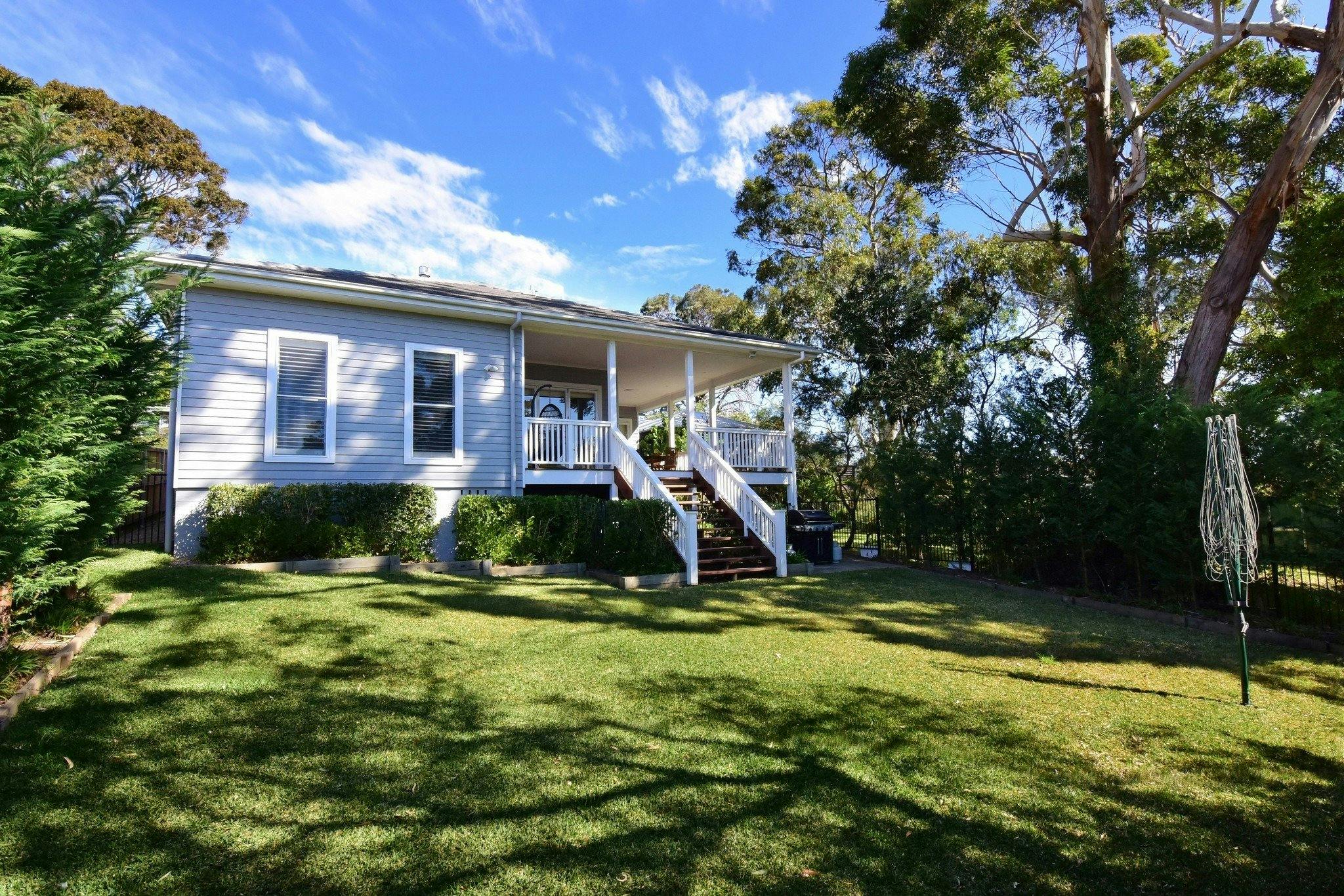 Backyard with deck and gardens