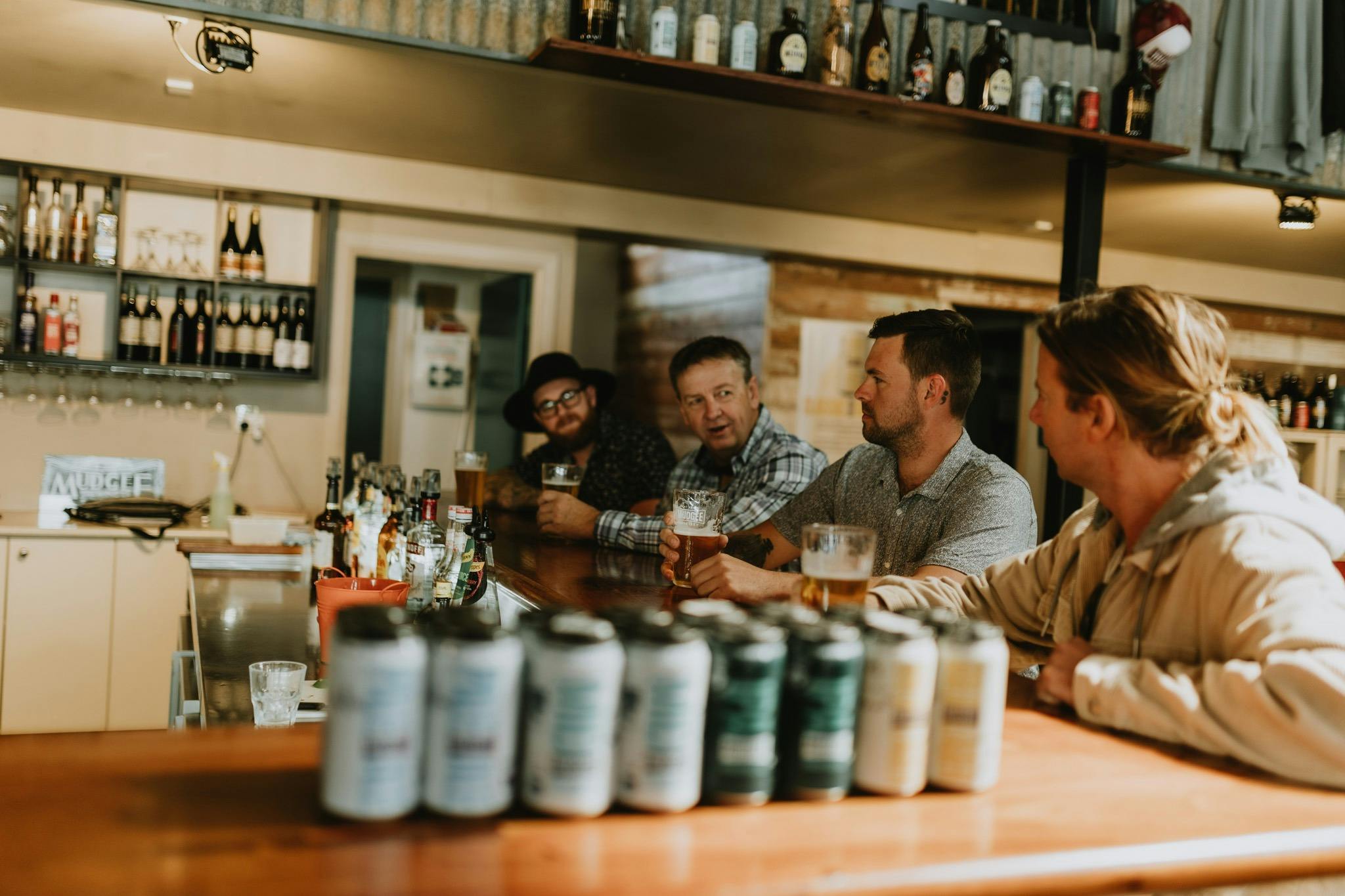 Mudgee Ale Trail tour participants sitting at a local brewery bar