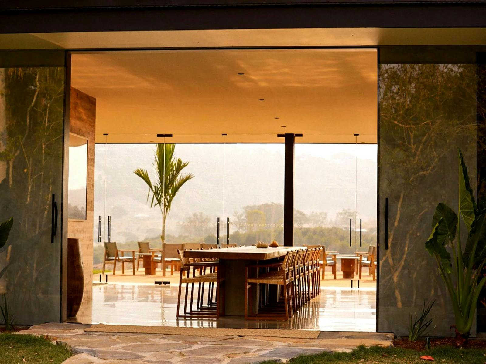 odern dining table with sleek chairs and minimalist decor