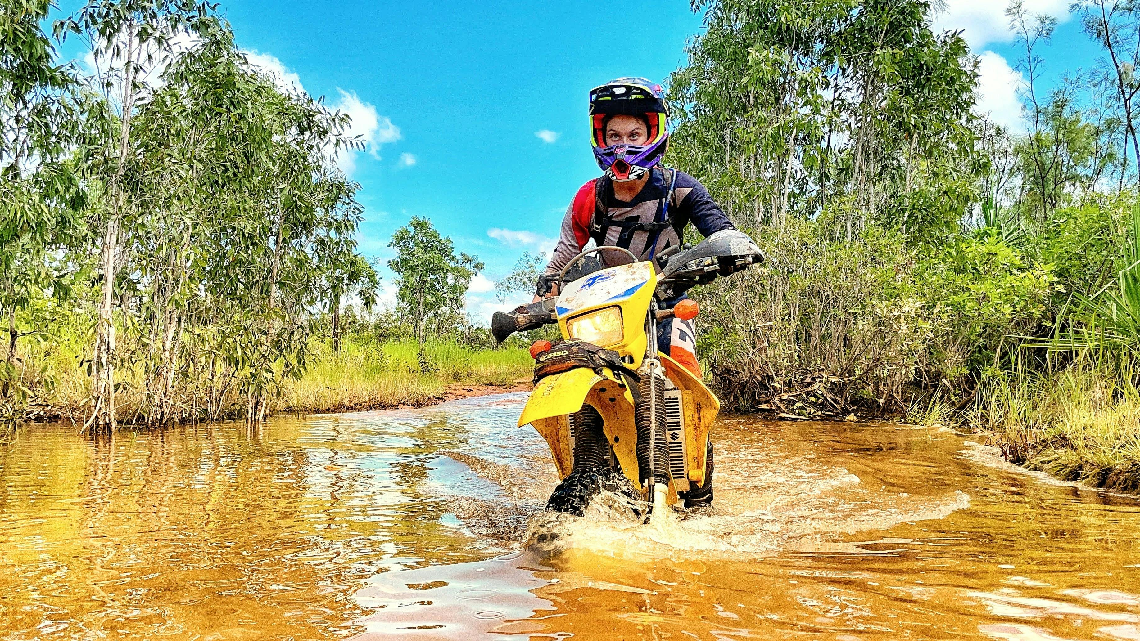Discovery Tours water crossing on a motorbike.