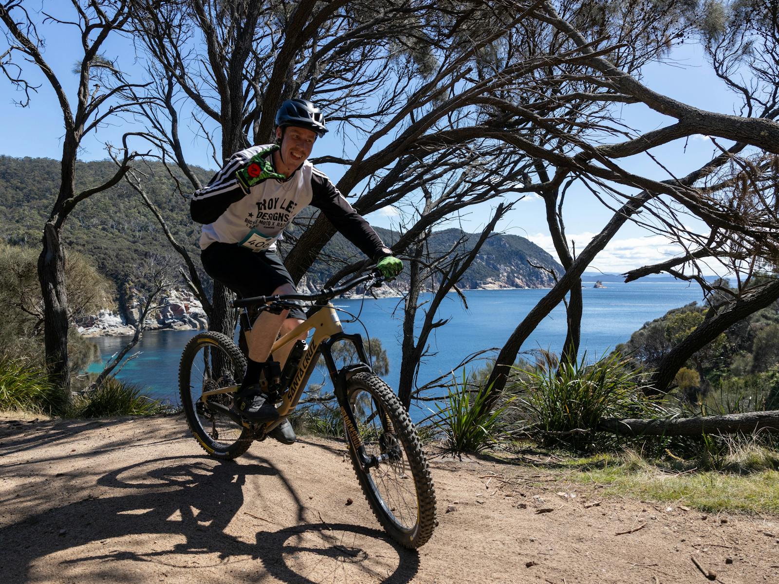 Riding in the Mountain Bike stage of the Freycinet Challenge at Coles Bay in Tasmania.
