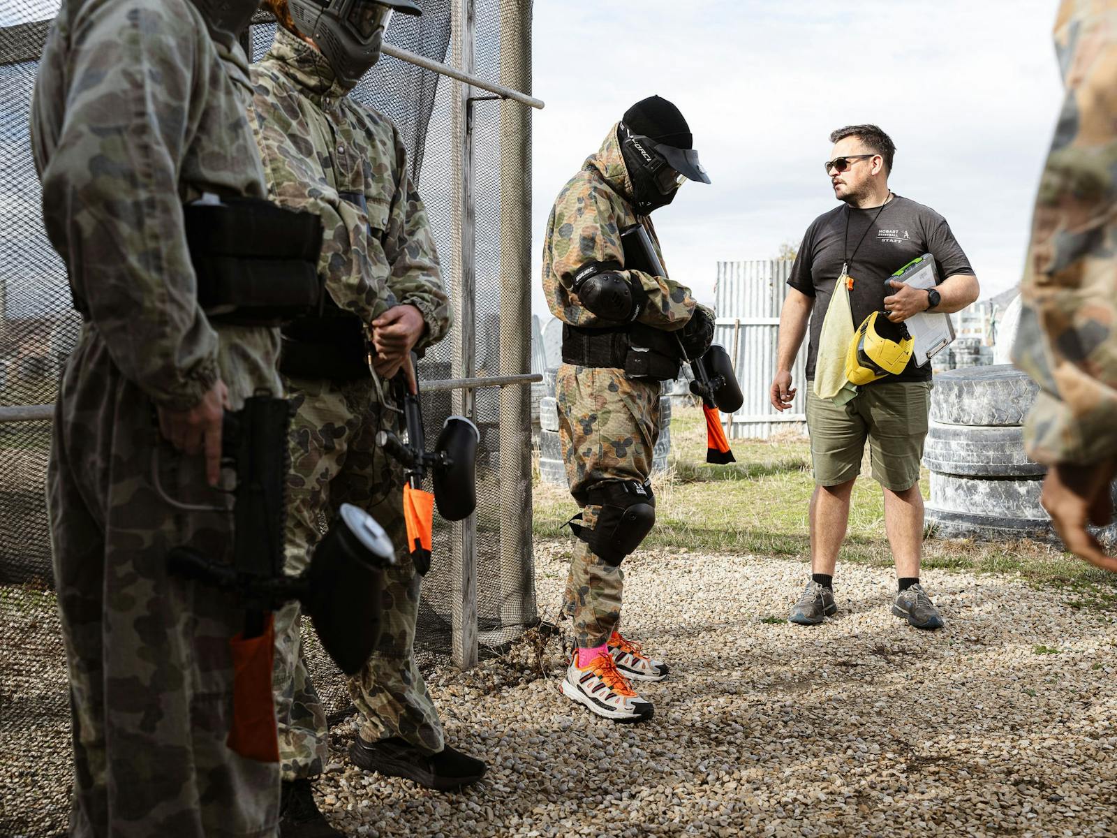 Referee discussing game with group