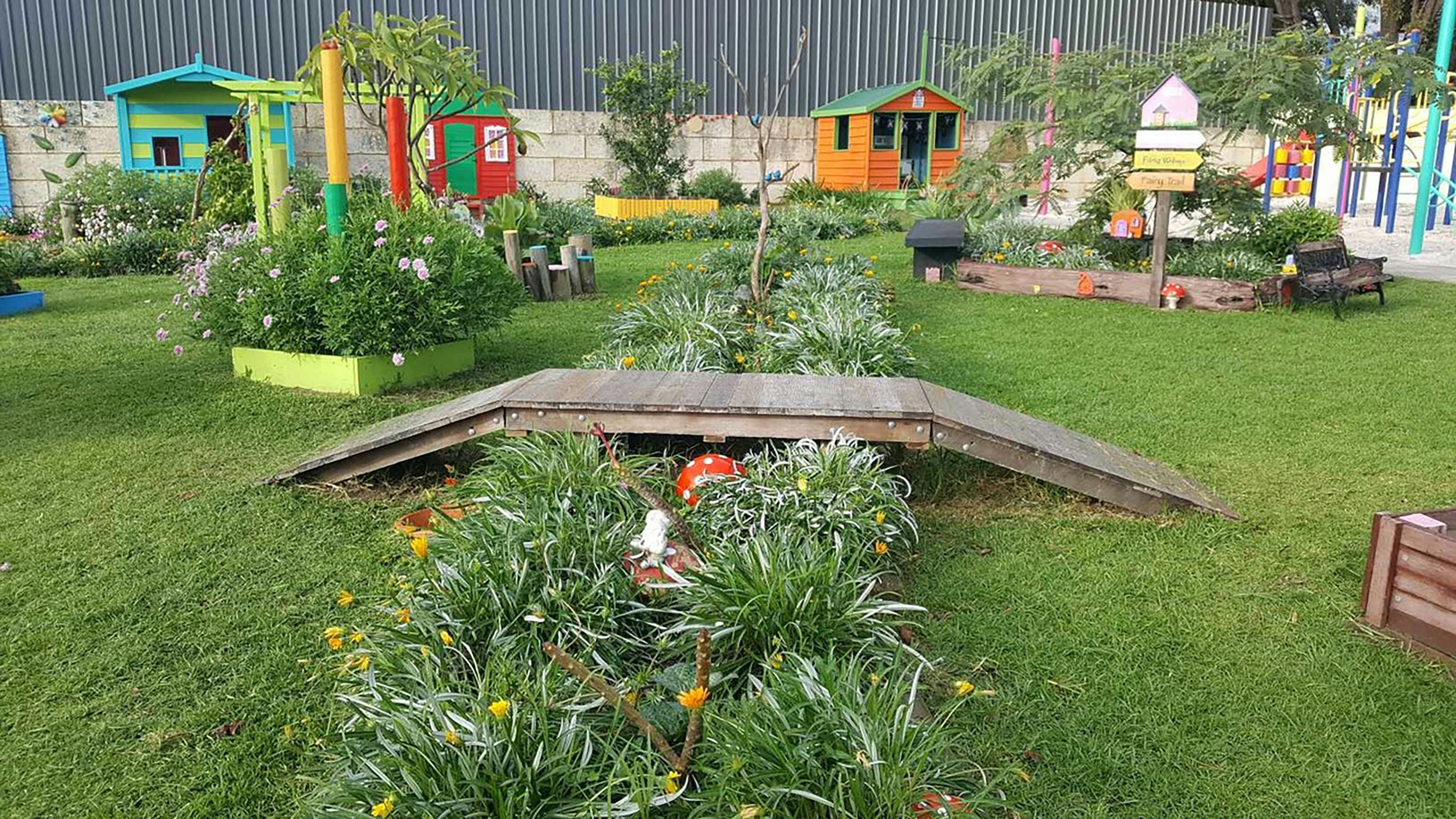 Many bridges and paths cross the gardens at Magic Barn.  Find fairies under the bridge.