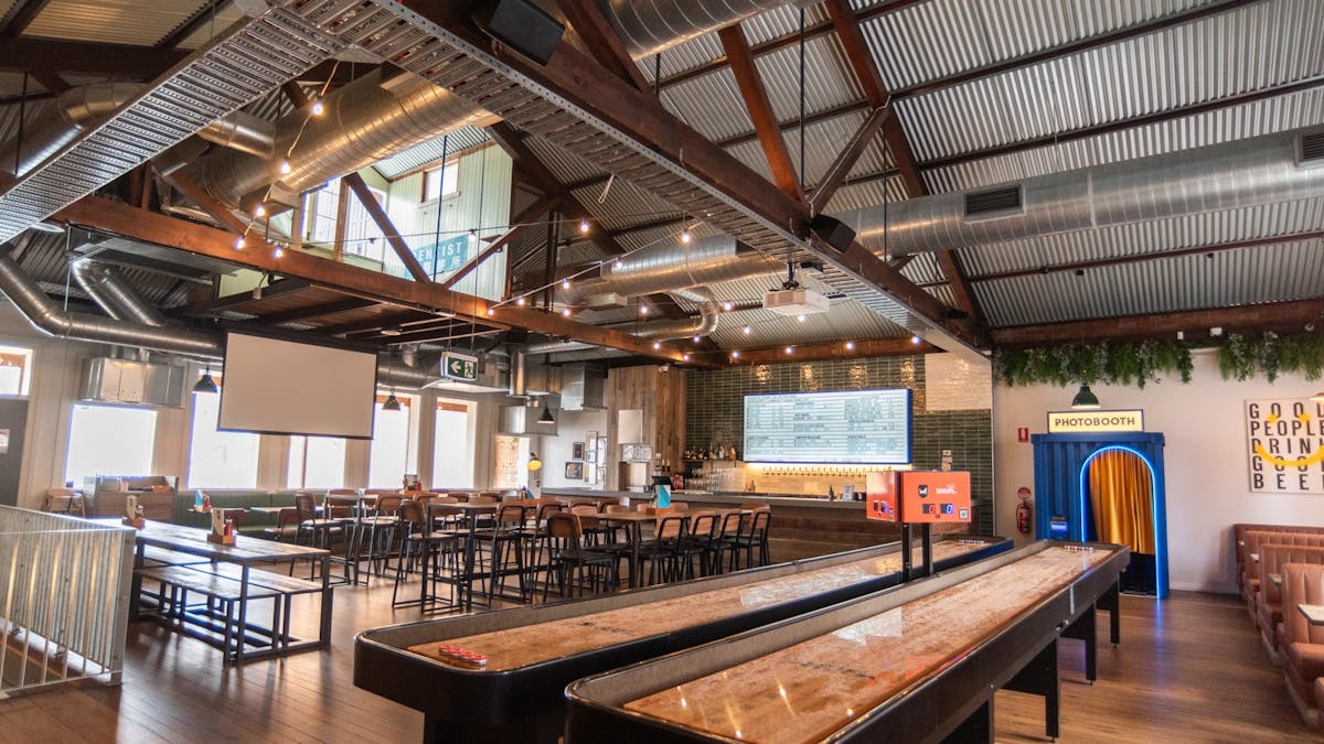 Top floor seating, photobooth, and shuffleboards