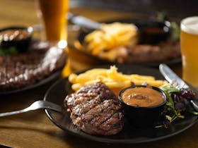 Choose from Porterhouse, Rump or Scotch Fillet. Gravies & toppings extra