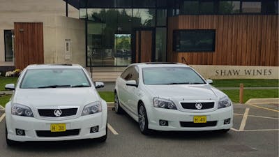 Shaw wines exterior wit two vehicles from Executive Driving Service