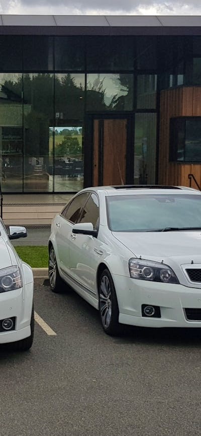 Shaw wines exterior wit two vehicles from Executive Driving Service