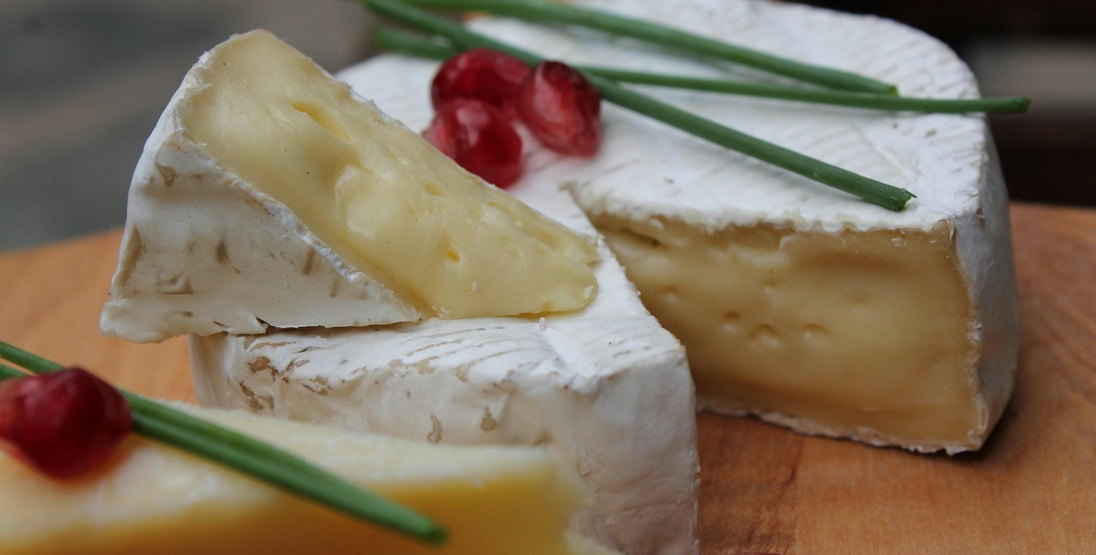 A cut wheel of cheese