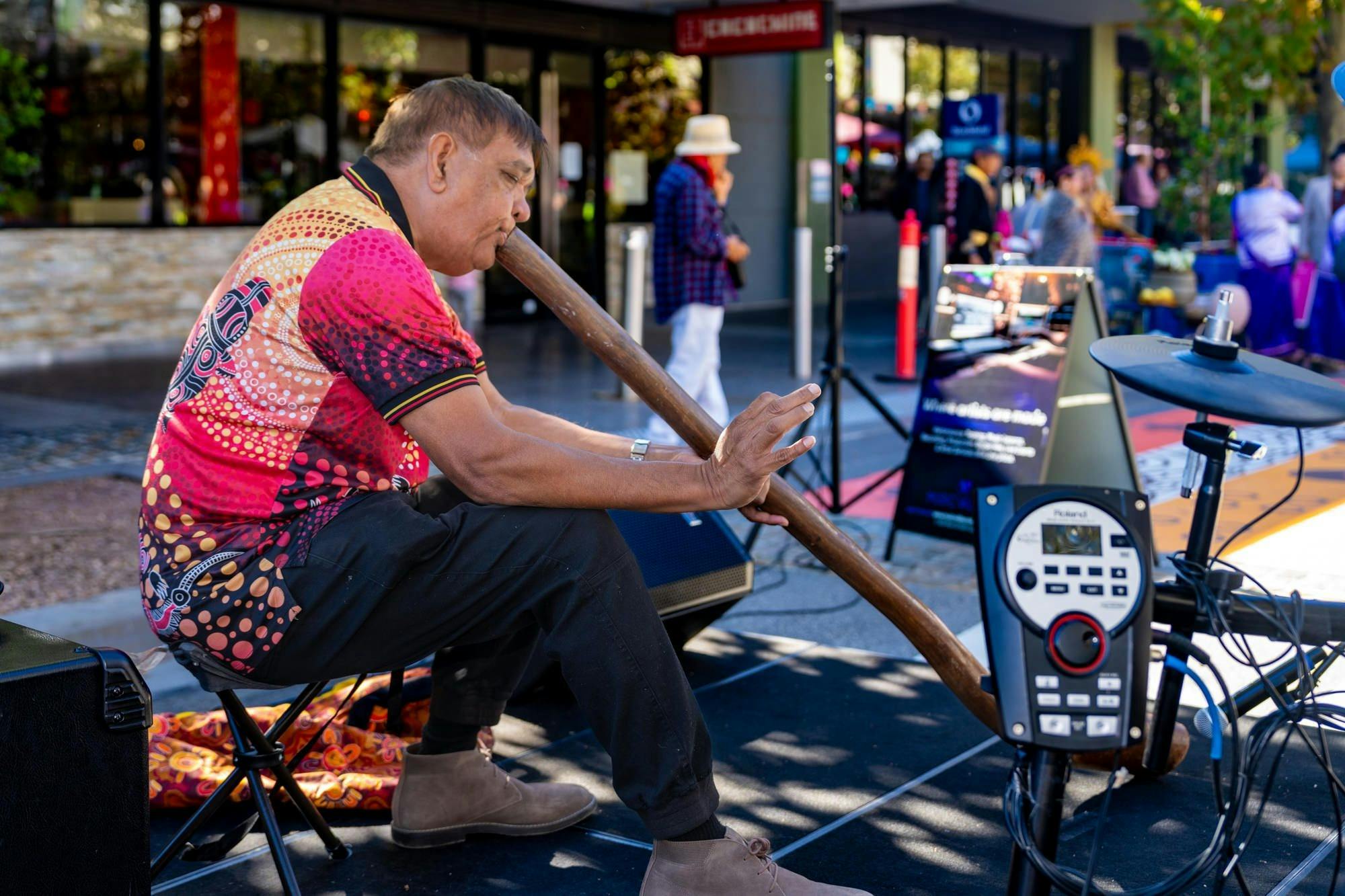 Man playing the didgeridoo