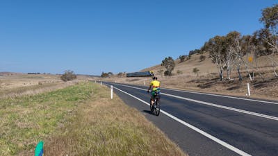 XPT train passing cyclist