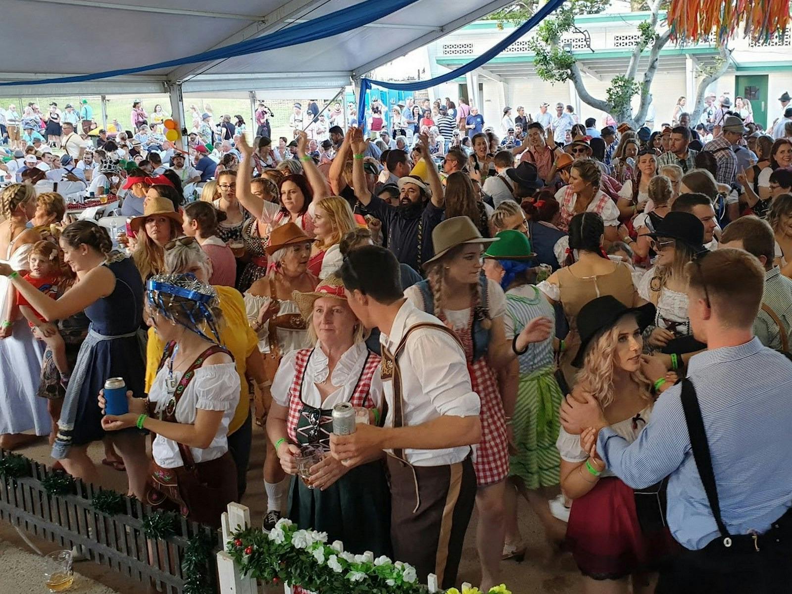 Crowd of people dancing at Oktoberfest