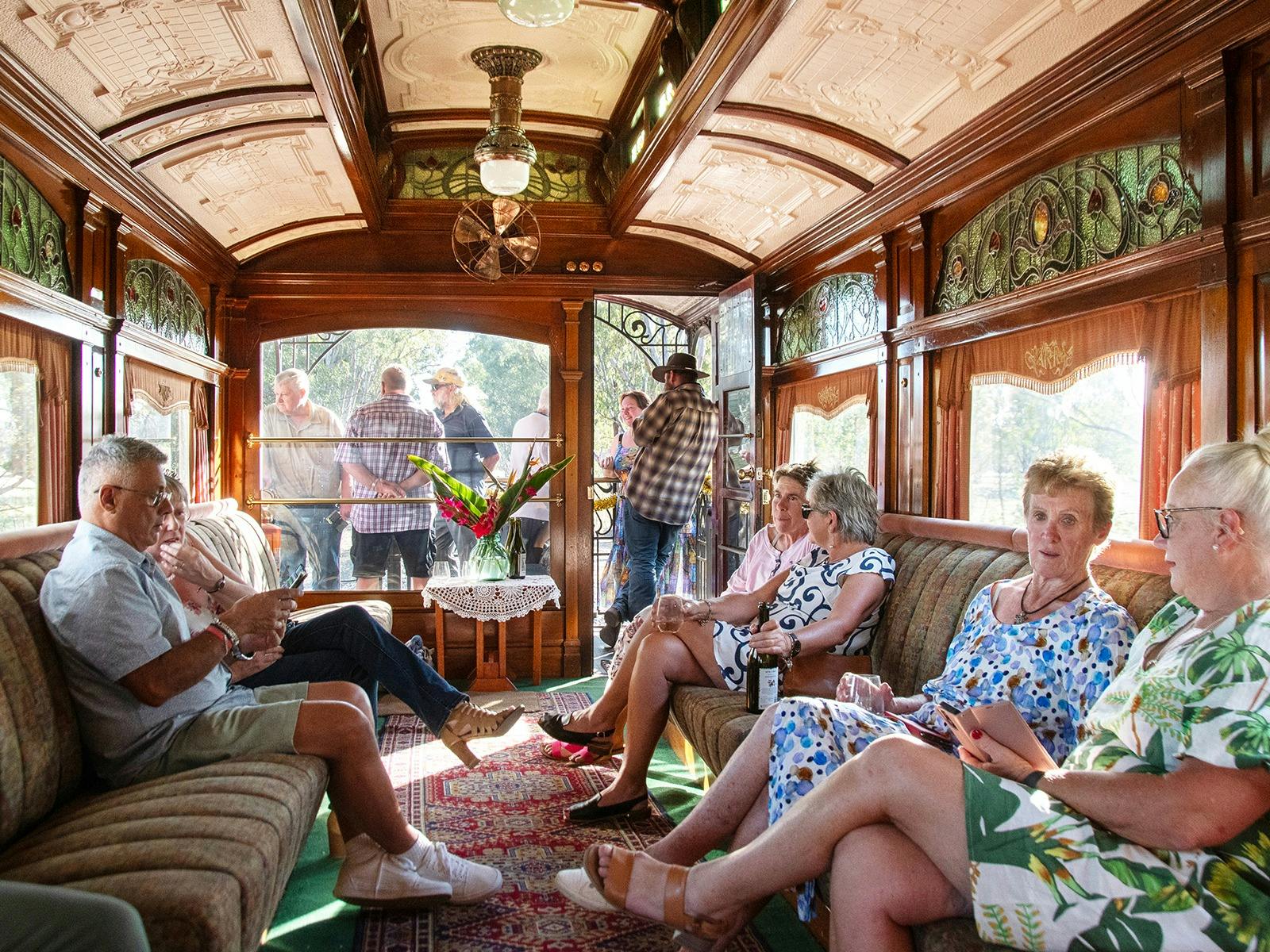 Passengers enjoy the 1st class observation car