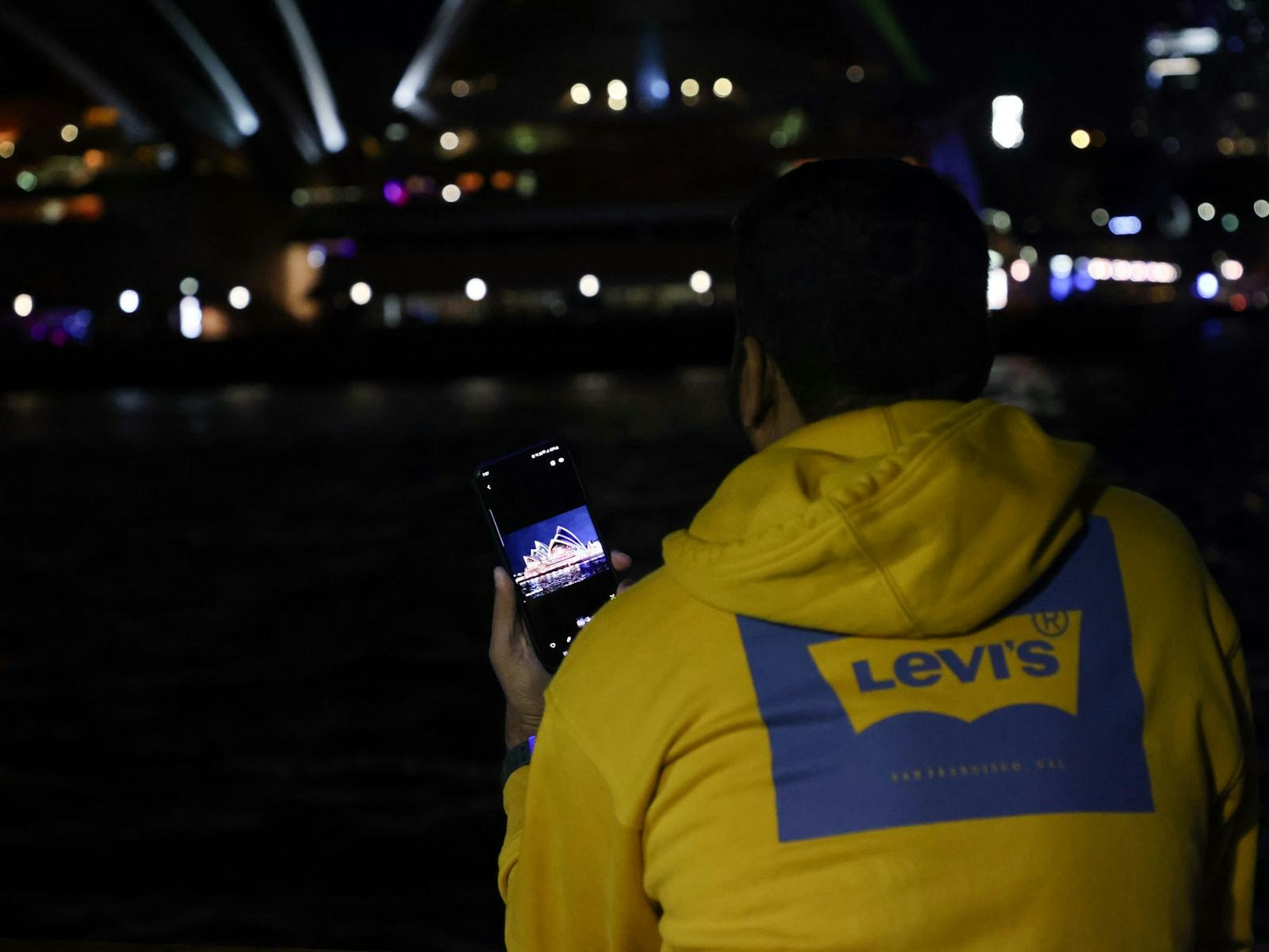 Vivid23 Person taking photos