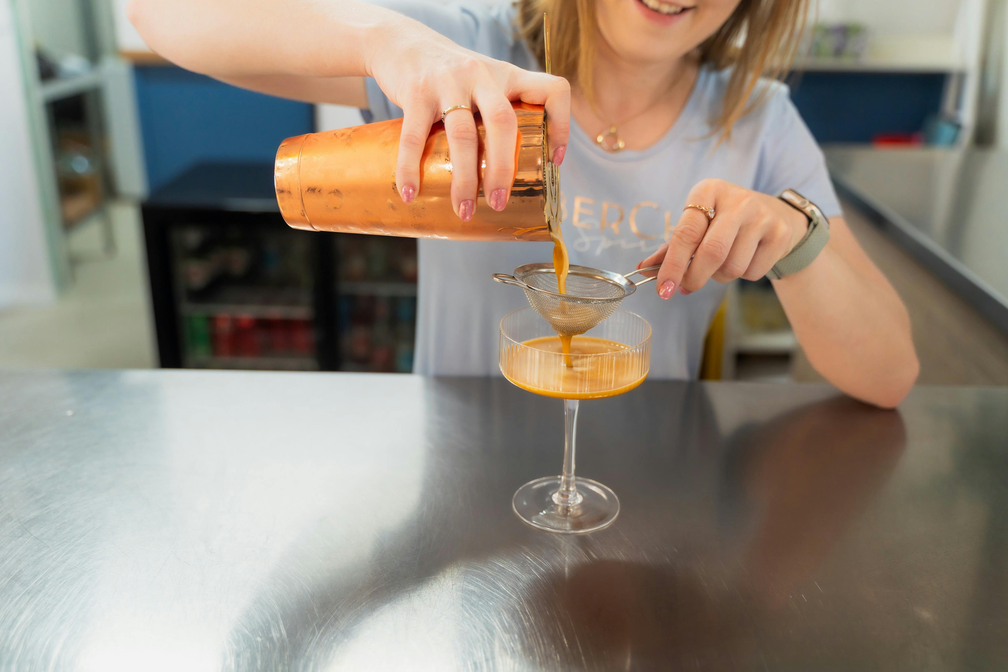 Cocktail being prepared at the bar at AmberChes Spirits Distillery