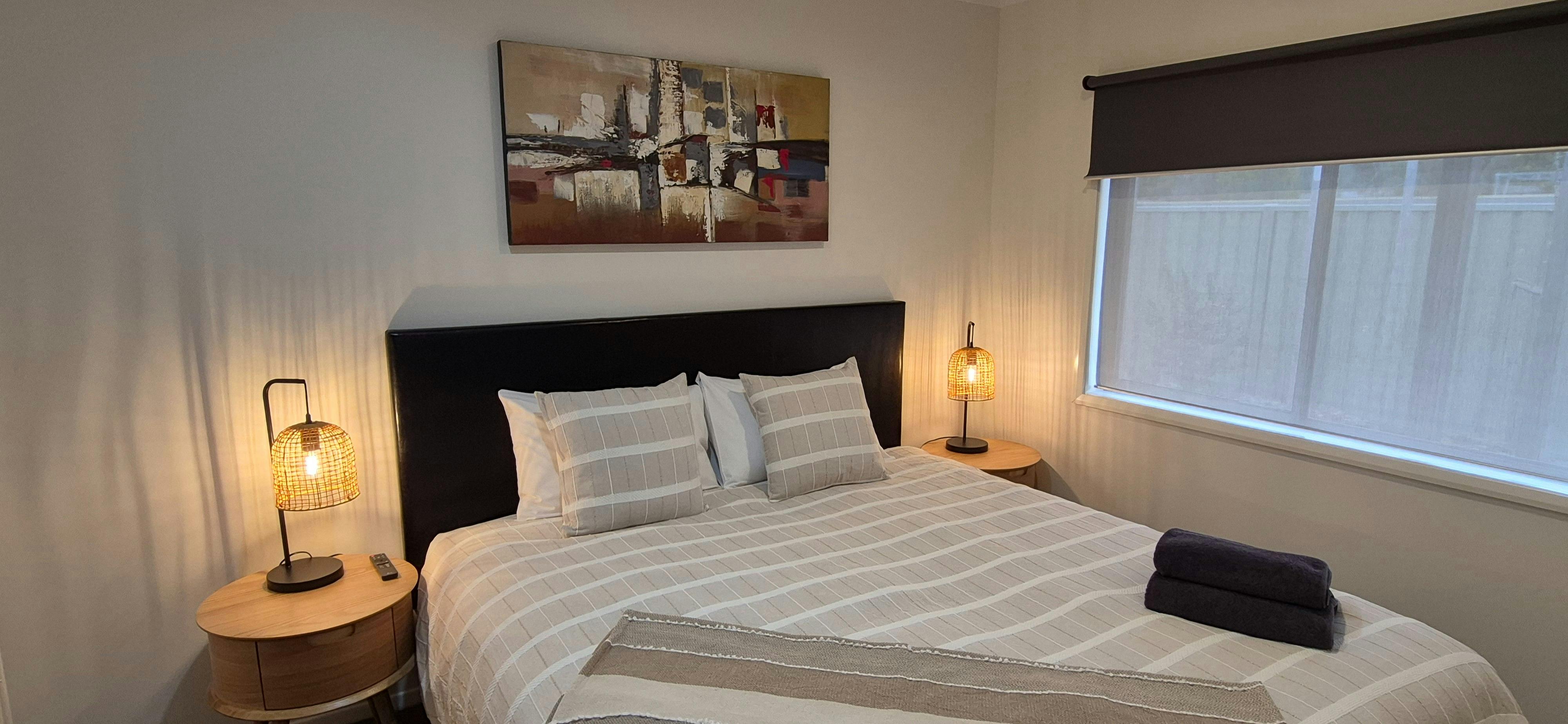 Featuring King size bed, block out blinds, heating and cooling, luggage rack, wardrobe