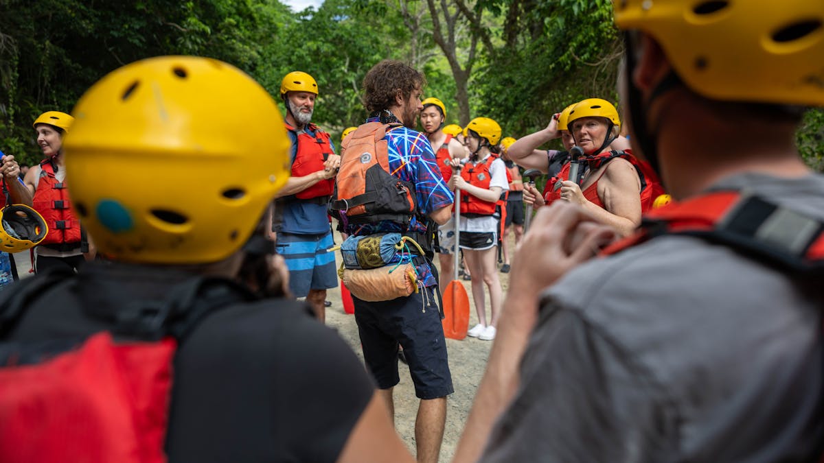 White Water Rafting Trip Leader Giving Safety Talk and Checking Safety Gear for the Barron River