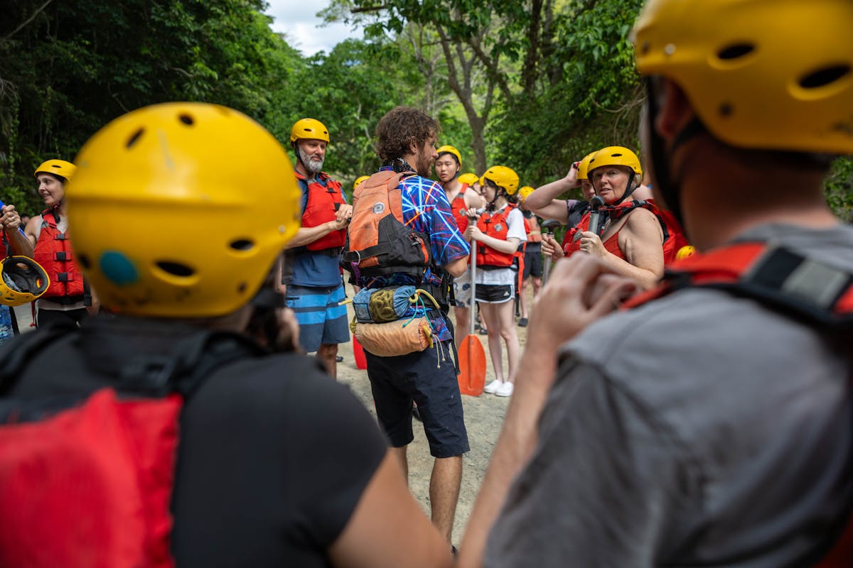 White Water Rafting Trip Leader Giving Safety Talk and Checking Safety Gear for the Barron River