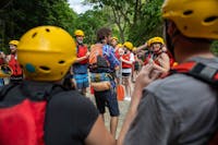 White Water Rafting Trip Leader Giving Safety Talk and Checking Safety Gear for the Barron River