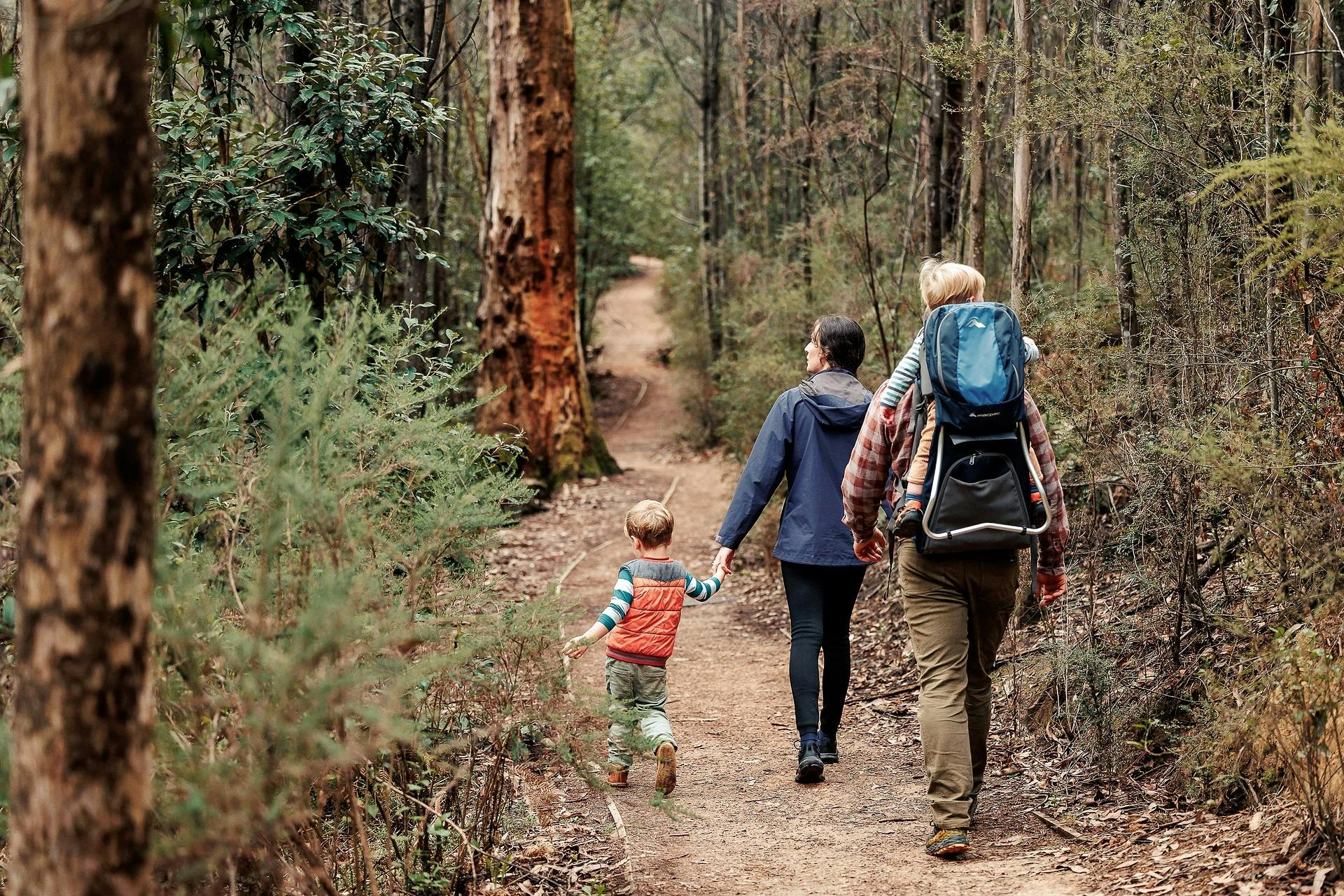 family of four walking