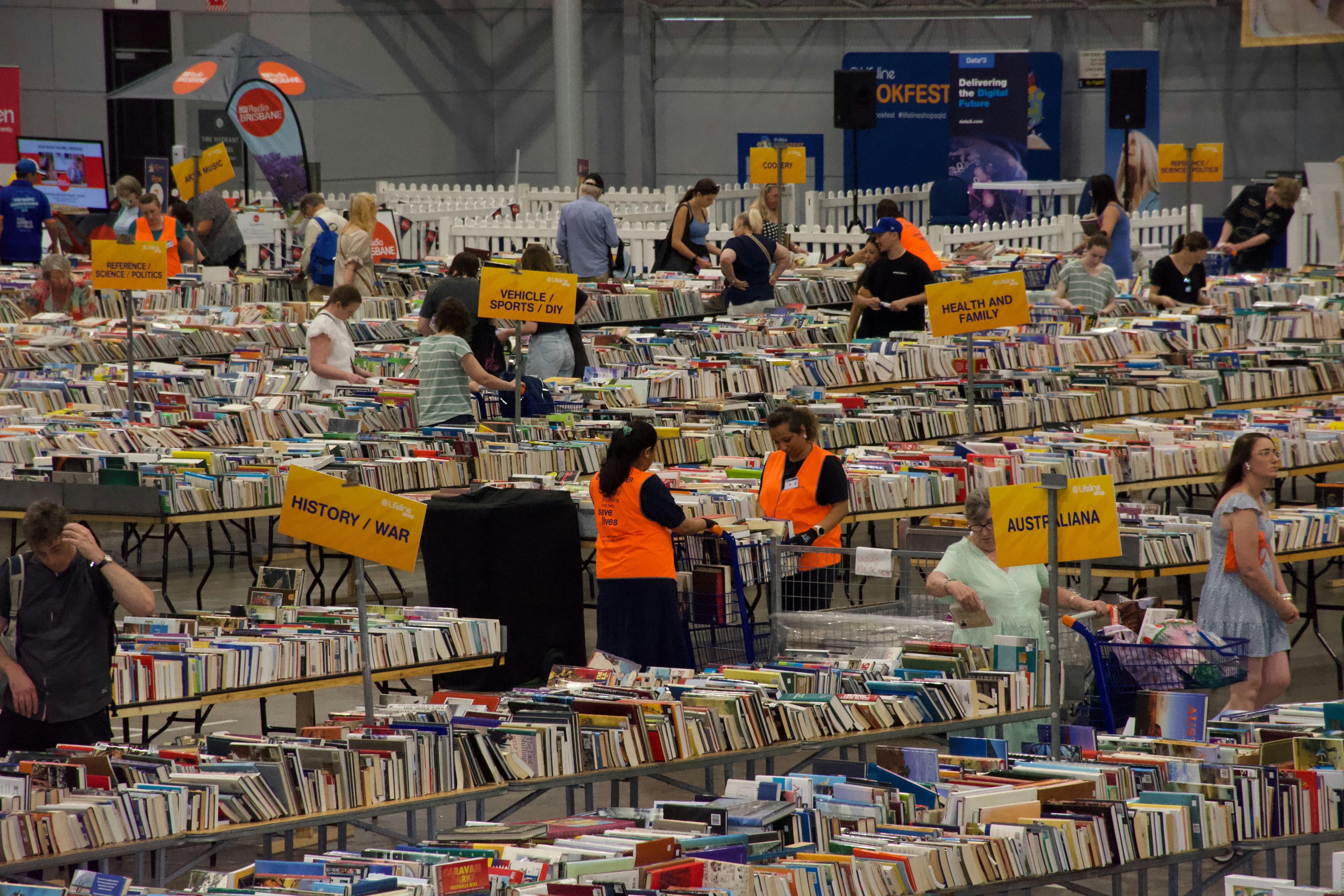Books on tables across the hall