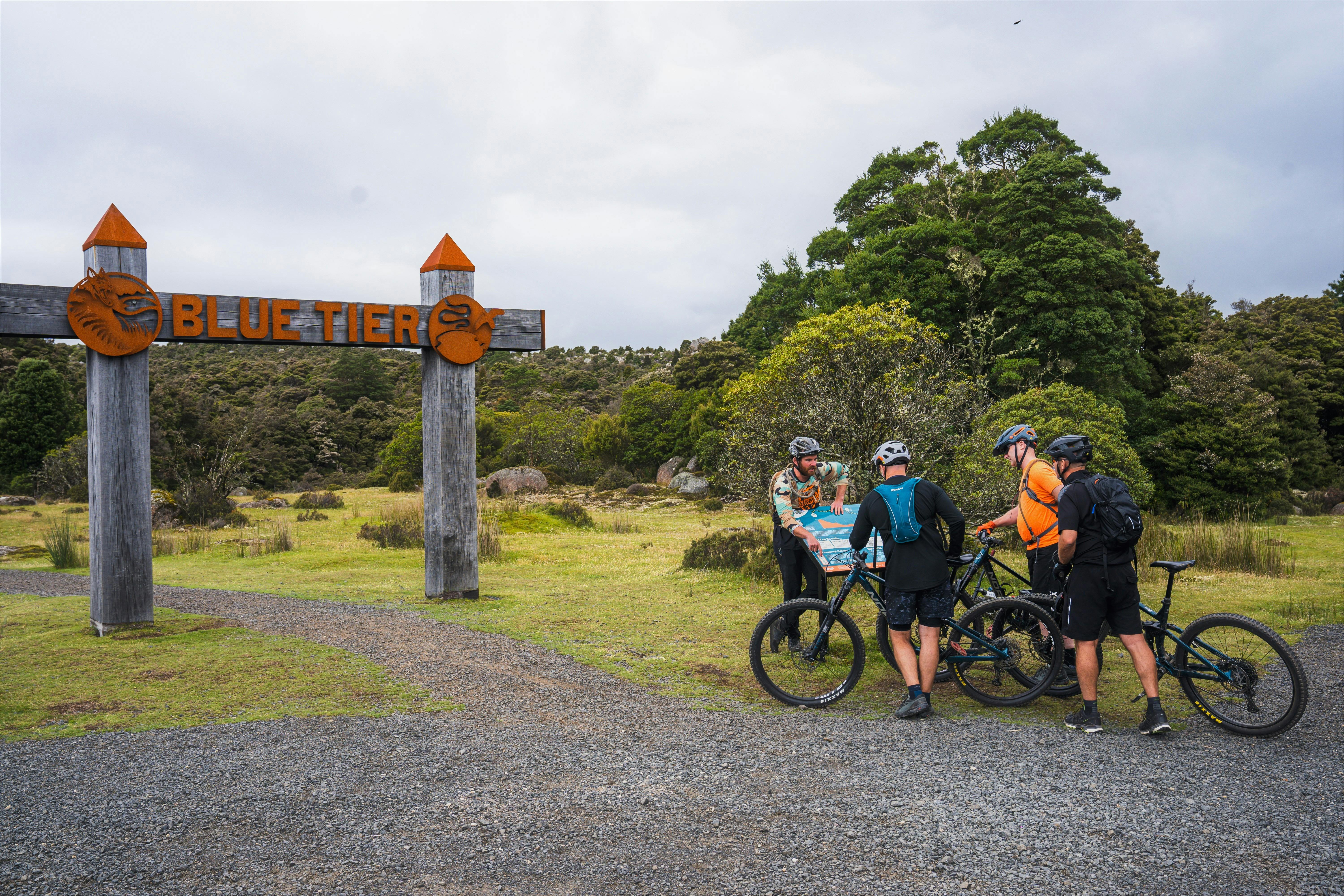 Rider briefing atop the Blue Tier before a guided ride along the Bay of Fires trail