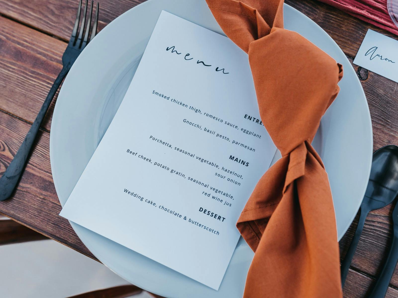 Menu with orange napkin