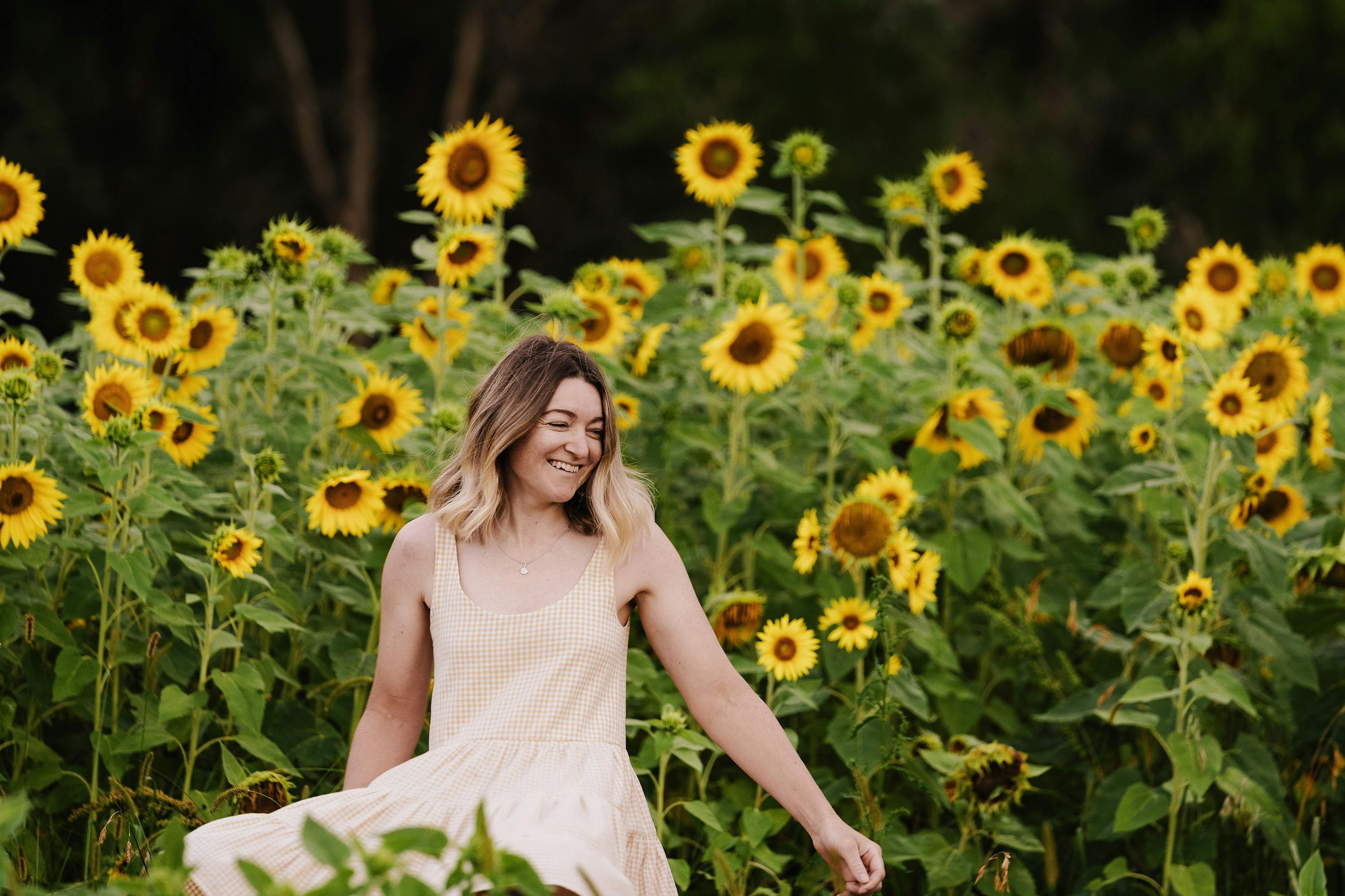 Taking photos and picking Sunflowers  from the Sunflower Field at Pepo Farms