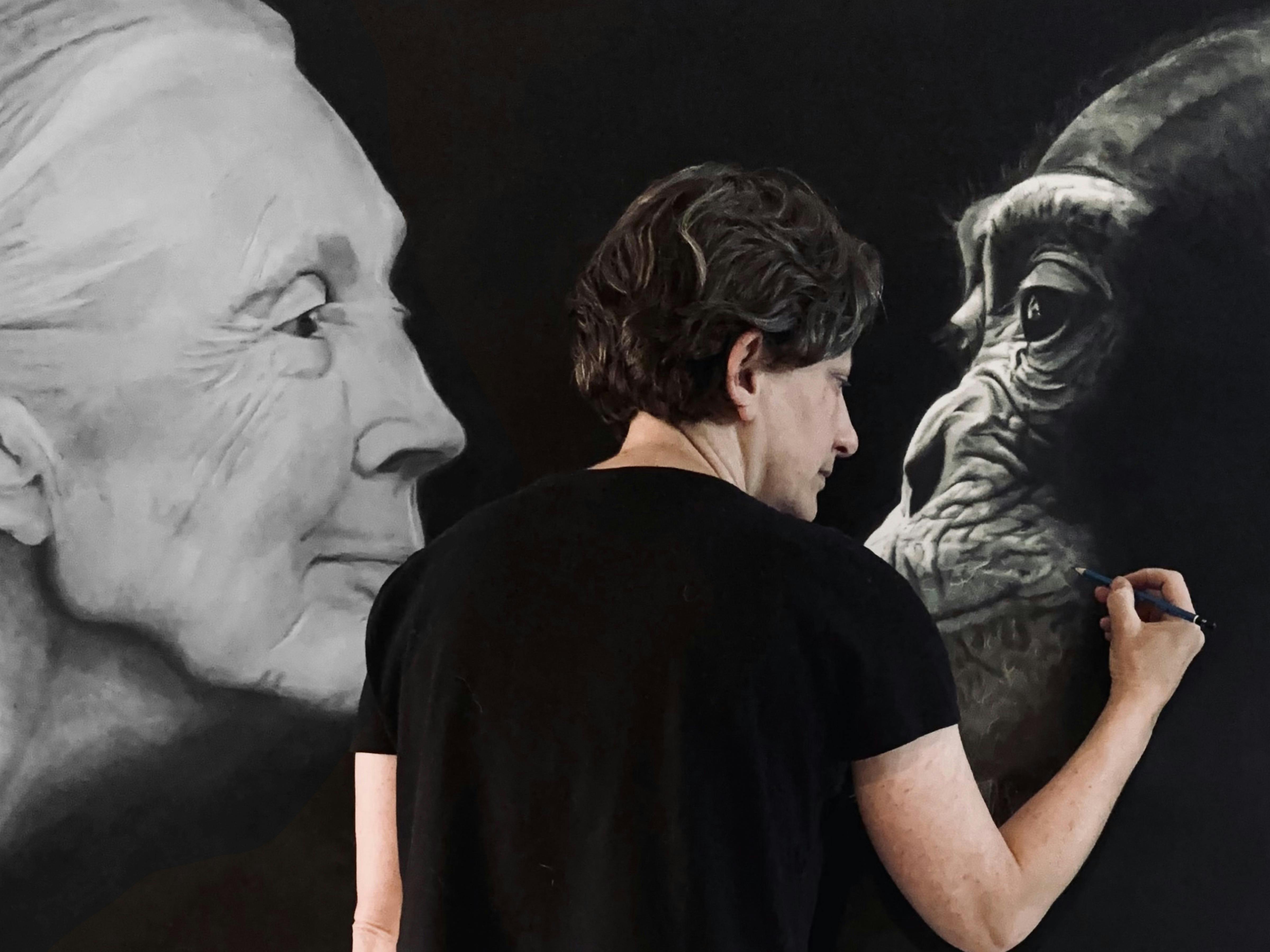 Jane Goodall drawing with  chimpanzee on black background and artist Cecile Michel
